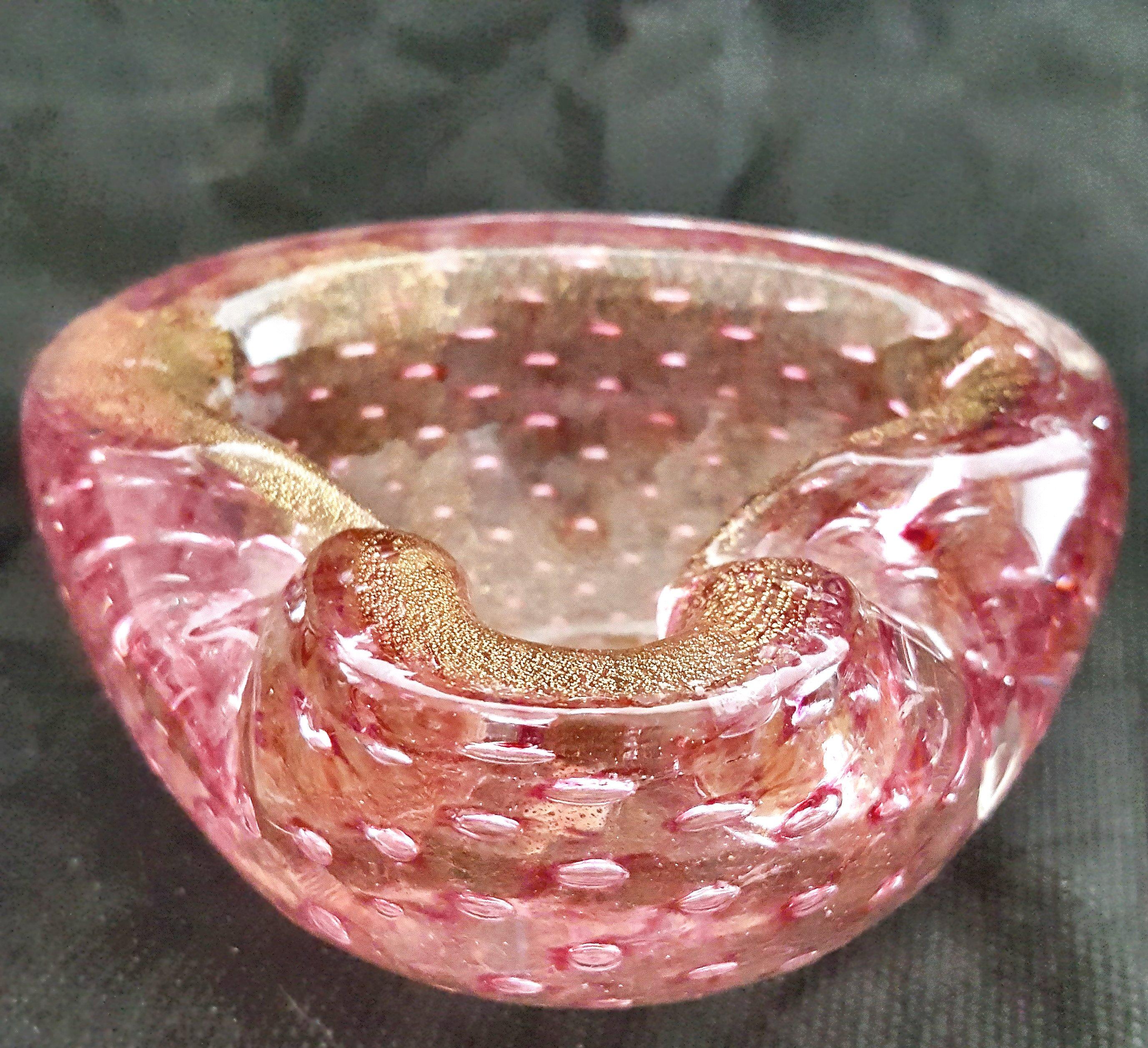 Murano Glass Bowl with Bullicante, Gold Polveri, Original Label Zanetti &

Pustetto & Zanetti Murano Glass Bowl with Bullicante, Gold Polveri, Original Label remains/remnant on bottom.
Color seems almost a watermelon hue. The glass is infused with