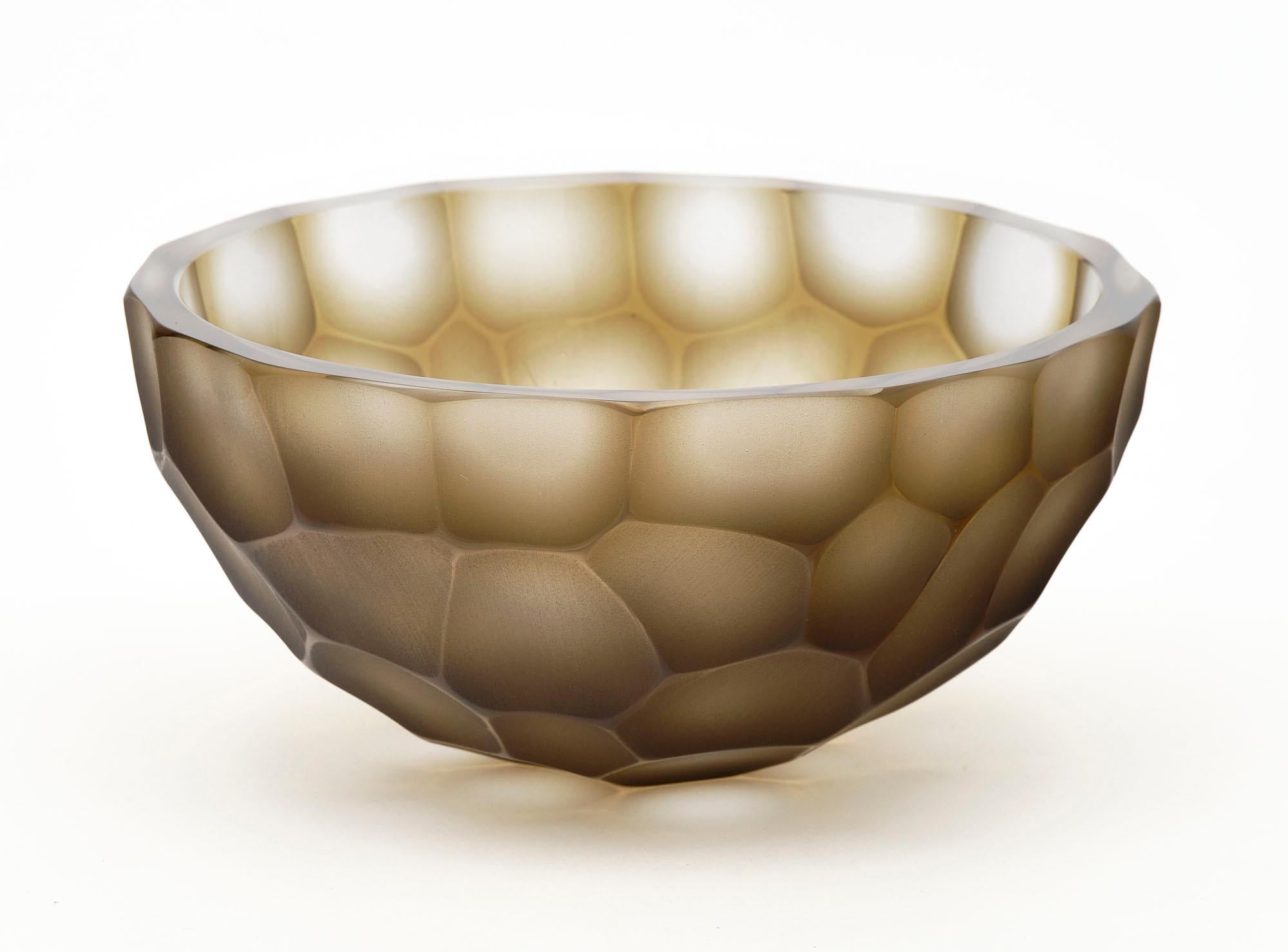 Pair of bowls from the island of Murano made of hand-blown glass in a smoked color. They have been crafted in the ferro battuto technique and are signed by Seguso.