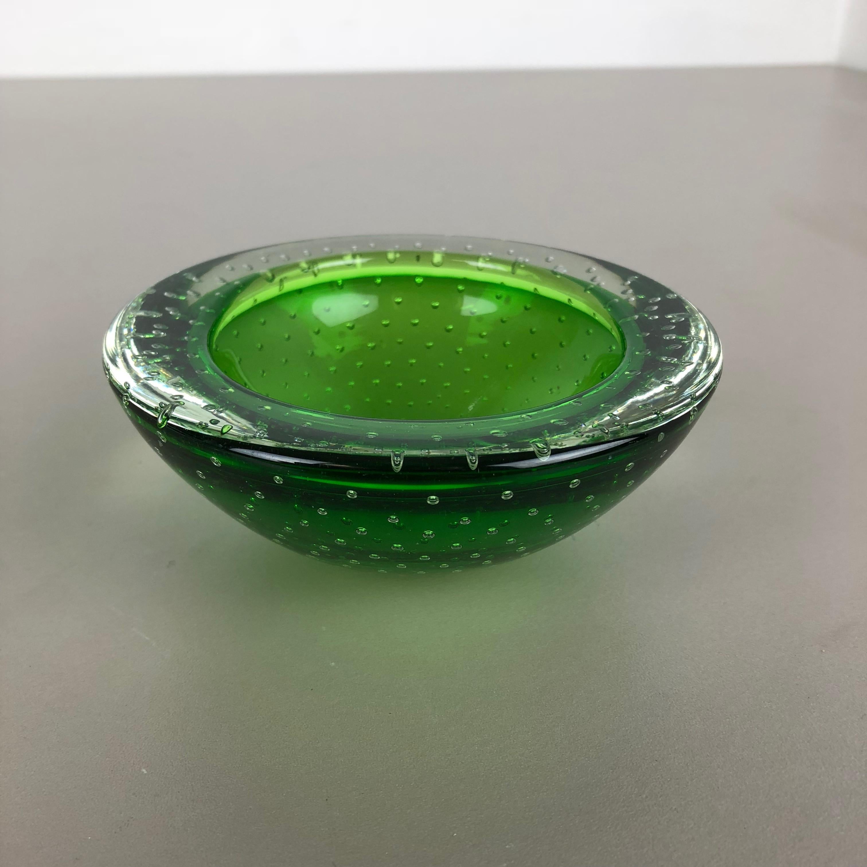 Article:

Murano glass bowl, ashtray element


Origin:

Murano, Italy


Decade:

1970s


This original glass shell bowl was produced in the 1970s in Murano, Italy. An elegant green Murano glass element utilizing the bullicante