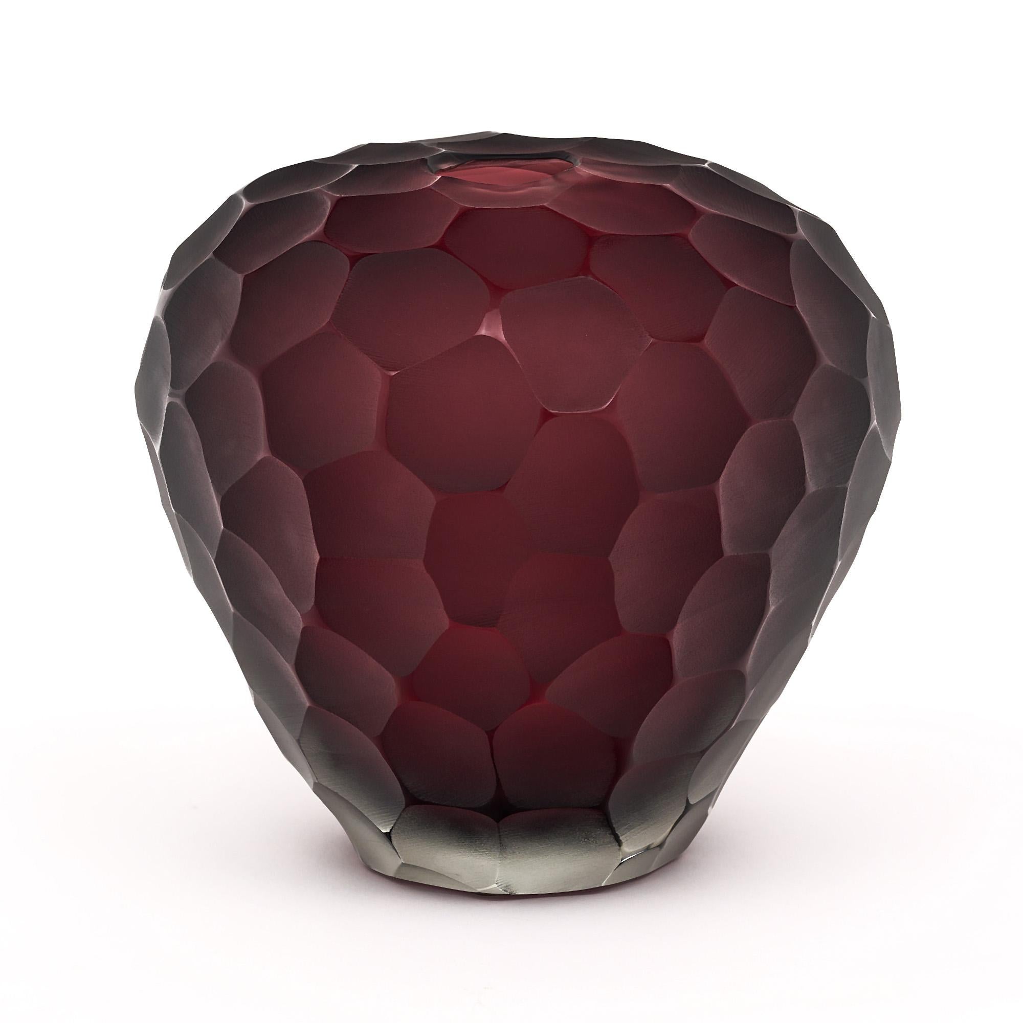 Vase, Italian, from the island of Murano. This hand-blown piece is made of warm burgundy colored glass in the hammered “battuto” style. In the manner of Ettoree Sottsass. Signed by glass maestro Alberto Dona.

This piece is in excellent condition