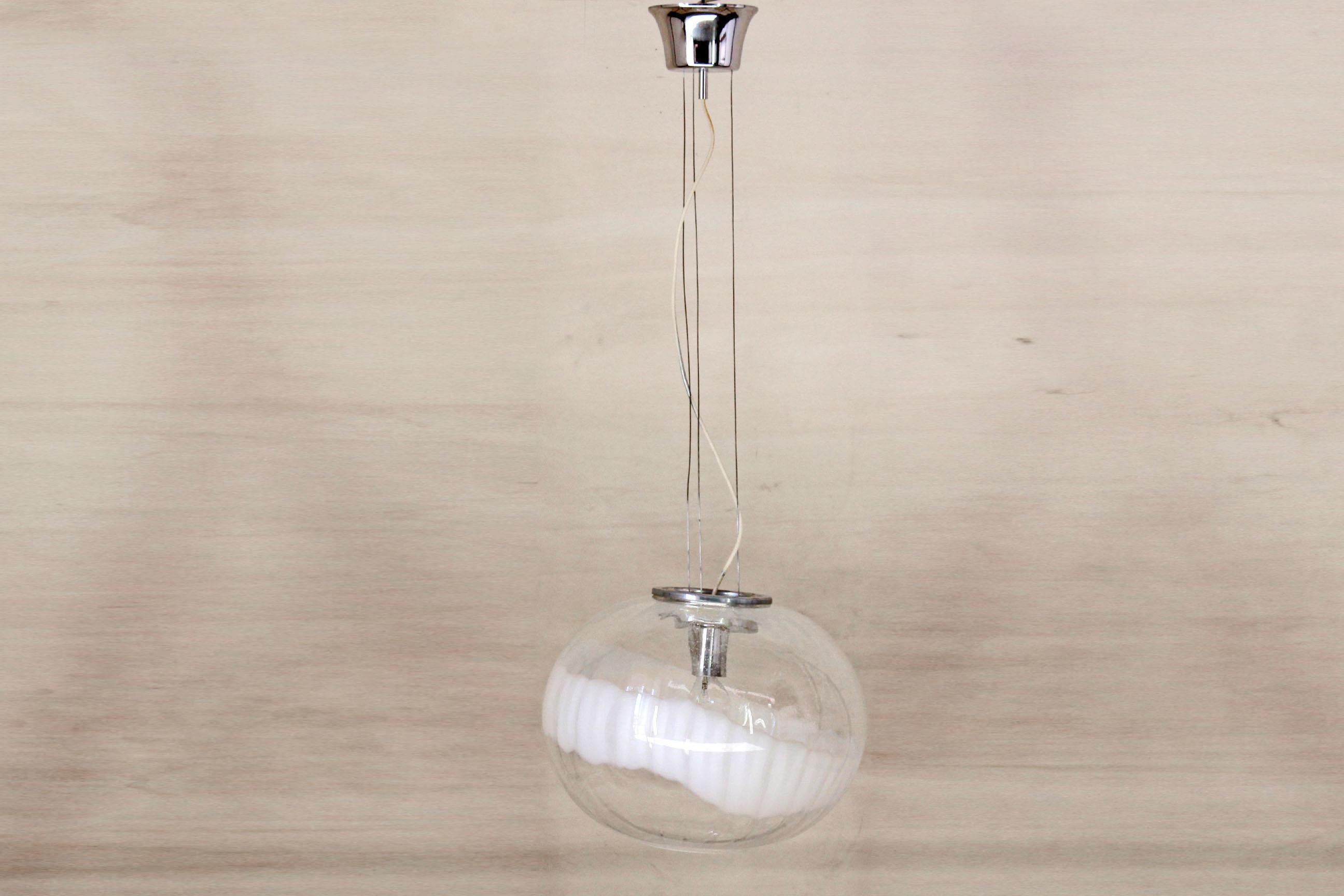 Murano ceiling light from the 1970s. Bicolor (white, transparent) artisanally blown glass, the electric parts have been recabled. Perfectly functioning. Measures: Murano globe height 35.
