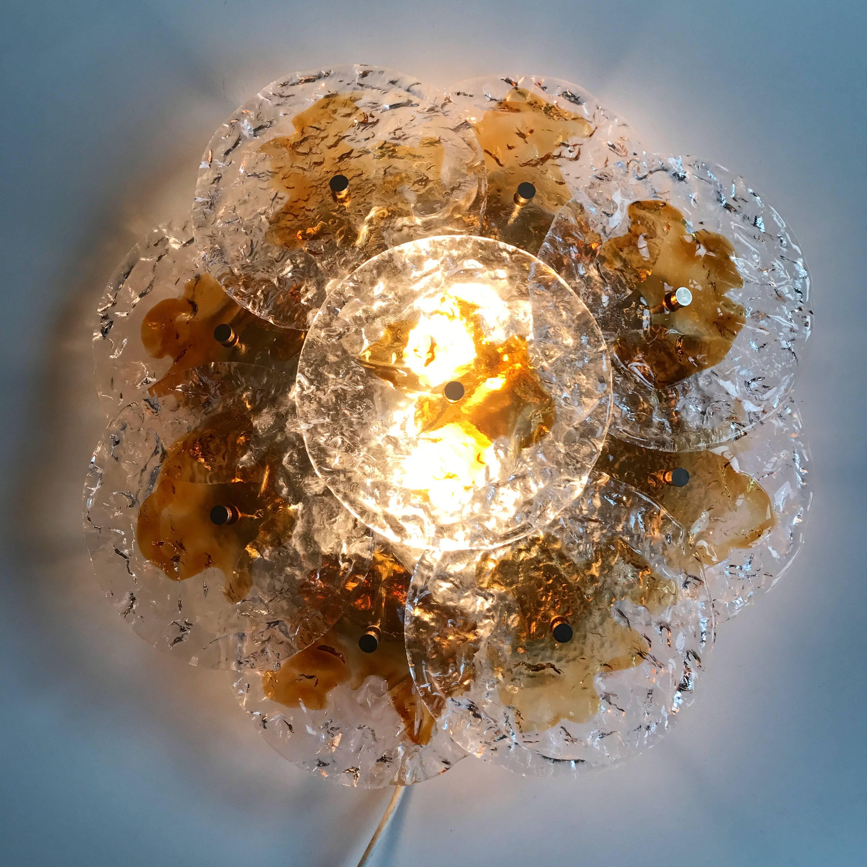 Amazing Mid-Century Modern flush mount ceiling lamp or wall light with Murano glass discs. Designed by Carlo Nason in 1960s. Manufactured by Mazzega, Italy.
Executed in nine bicolor Murano glass discs and metal fixture. The lamp needs two E27 screw