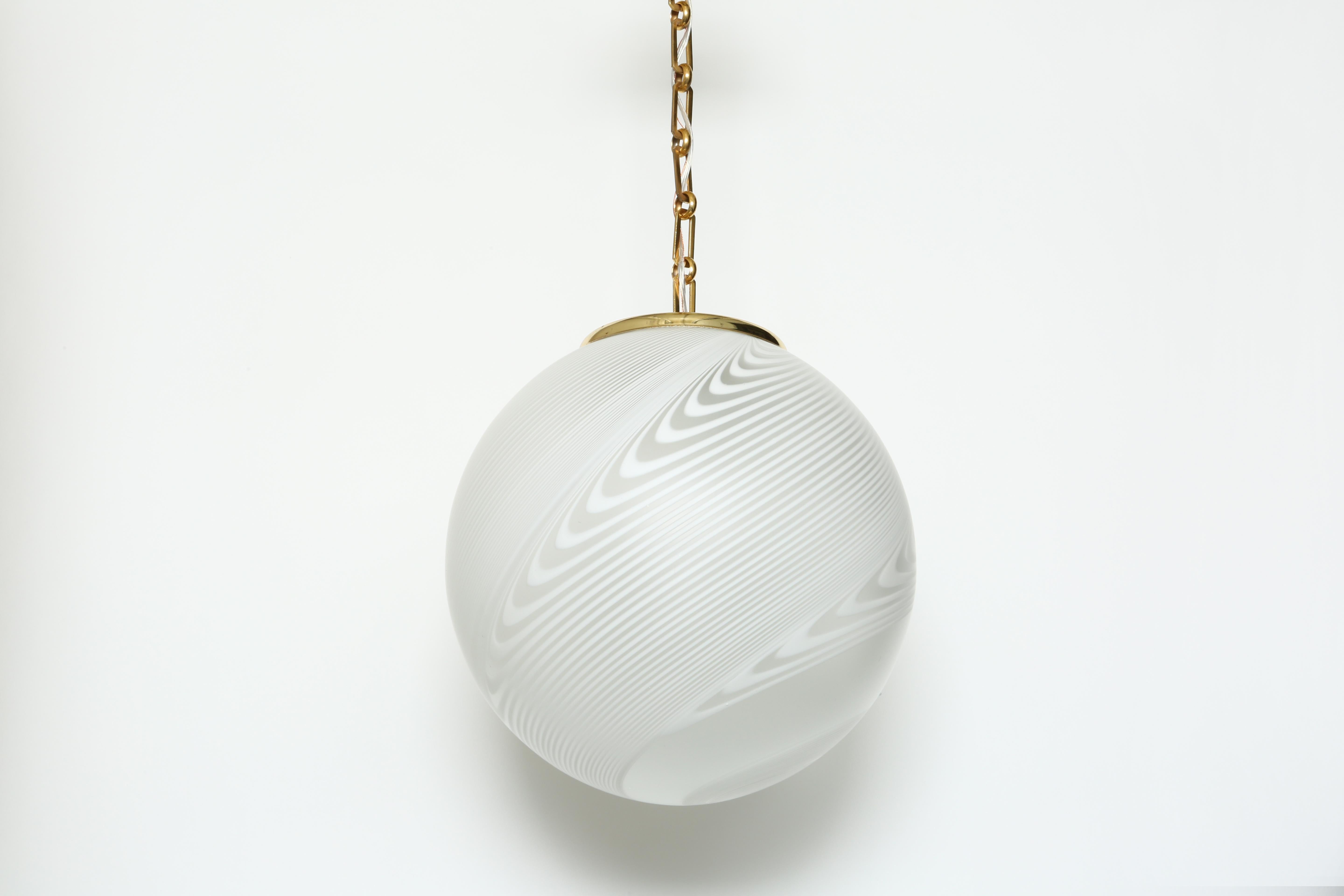 Murano style globe ceiling pendant.
Large ceiling pendant with swirl design.
Italy, 1970s.
 