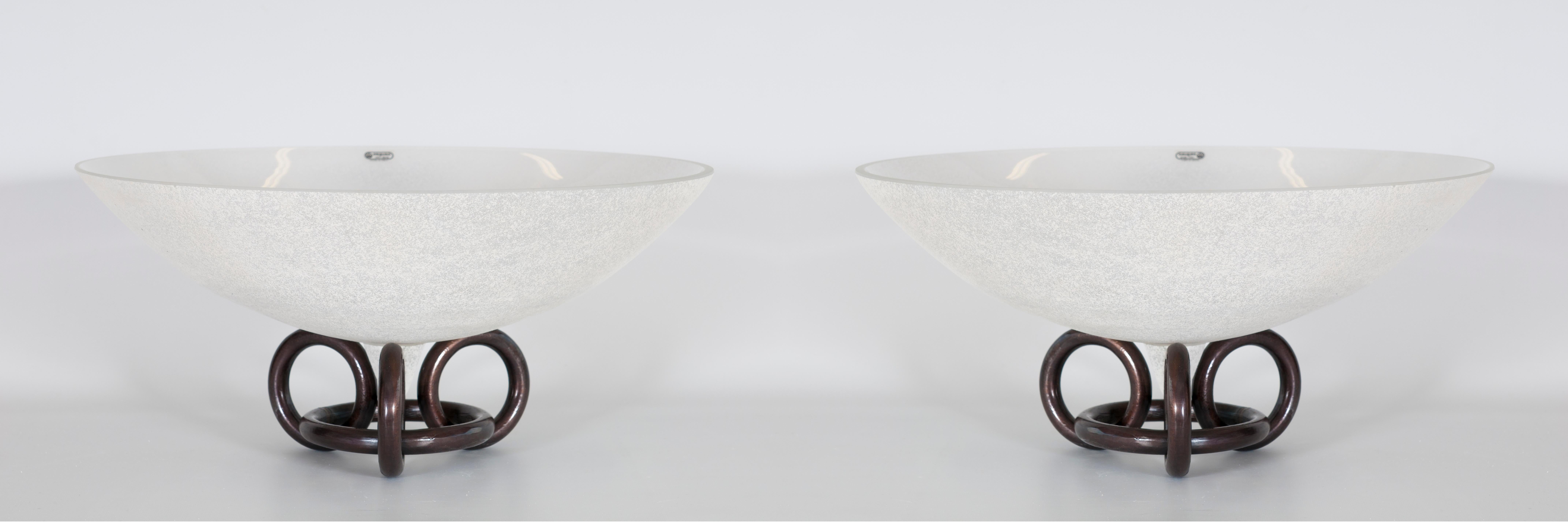 An elegant and rare centerpiece bowl crafted in Murano, Italy by the renowned glassmaker Seguso in the 1970s. This striking piece features a wide, shallow bowl made of textured, frosted glass with a subtle white and grey speckle finish. The bowl