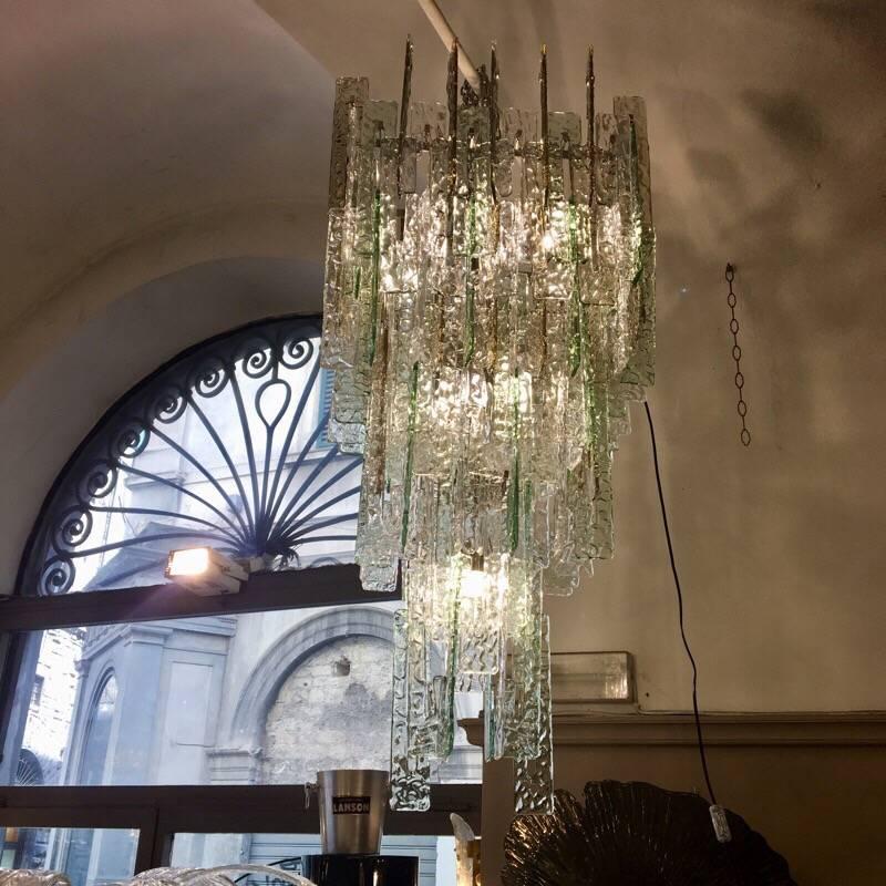 Murano glass chain link chandelier with light green, fumee and clear glass C shaped glass pieces, chrome frame, ten bulbs.
 