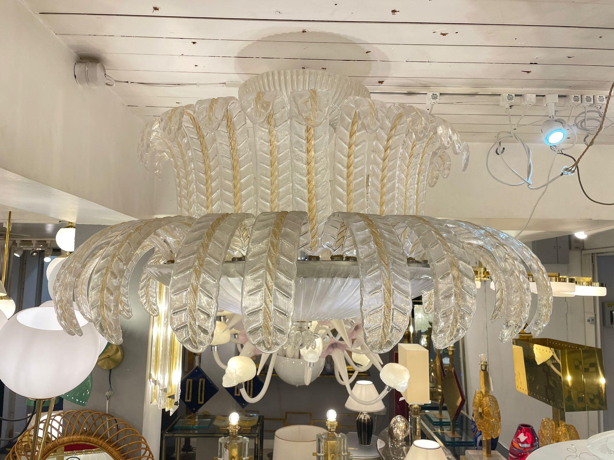 Stunning  oversized chandeliers with leaves in Murano glass and gold inclusions attributed to Barovier & Toso.