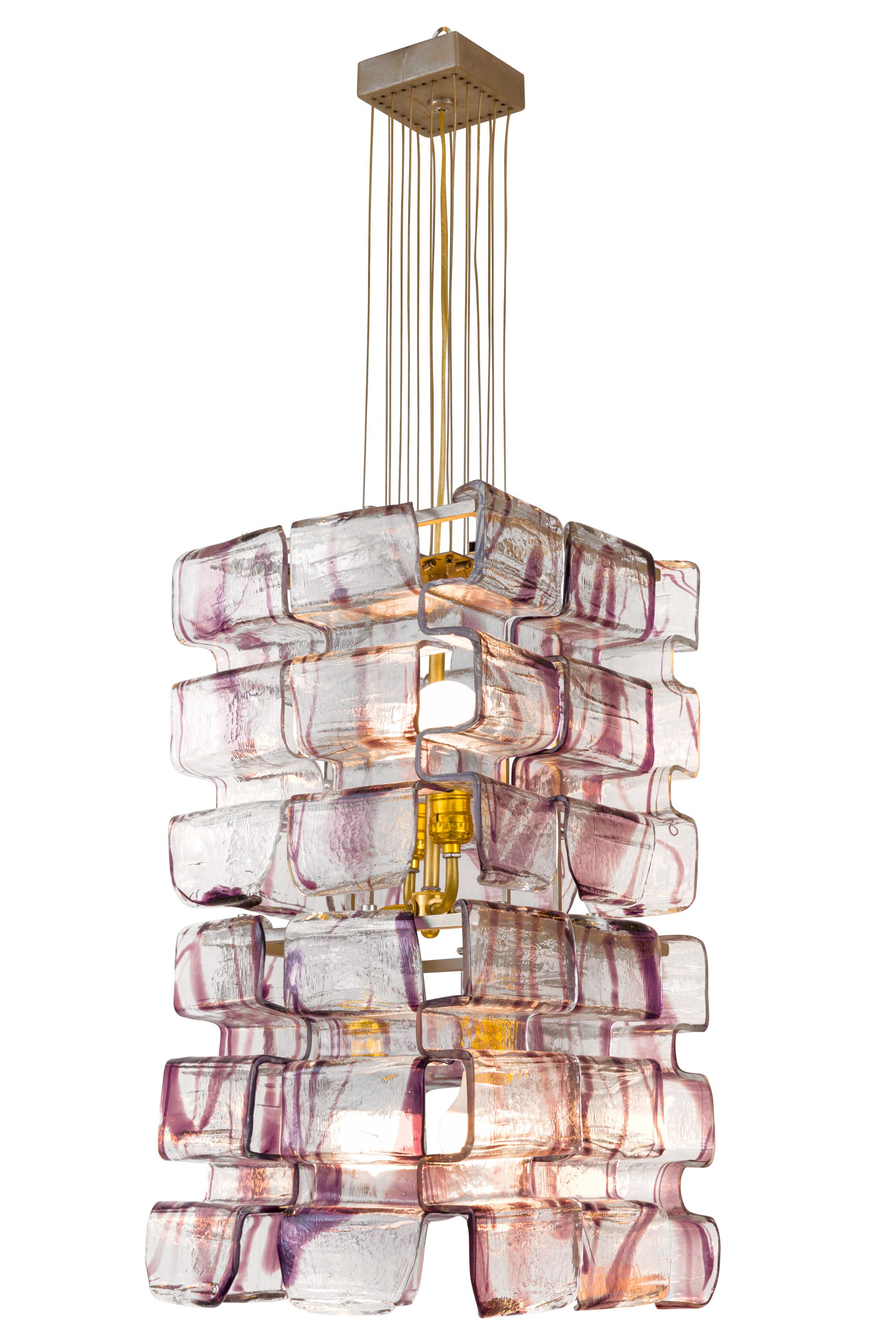 One of a series of chandeliers that were originally in a casino in Italy. They have a spectacular look due to the shape of the Murano glass elements that hang from the frame. We have numerous sizes available. The measurements indicated include the