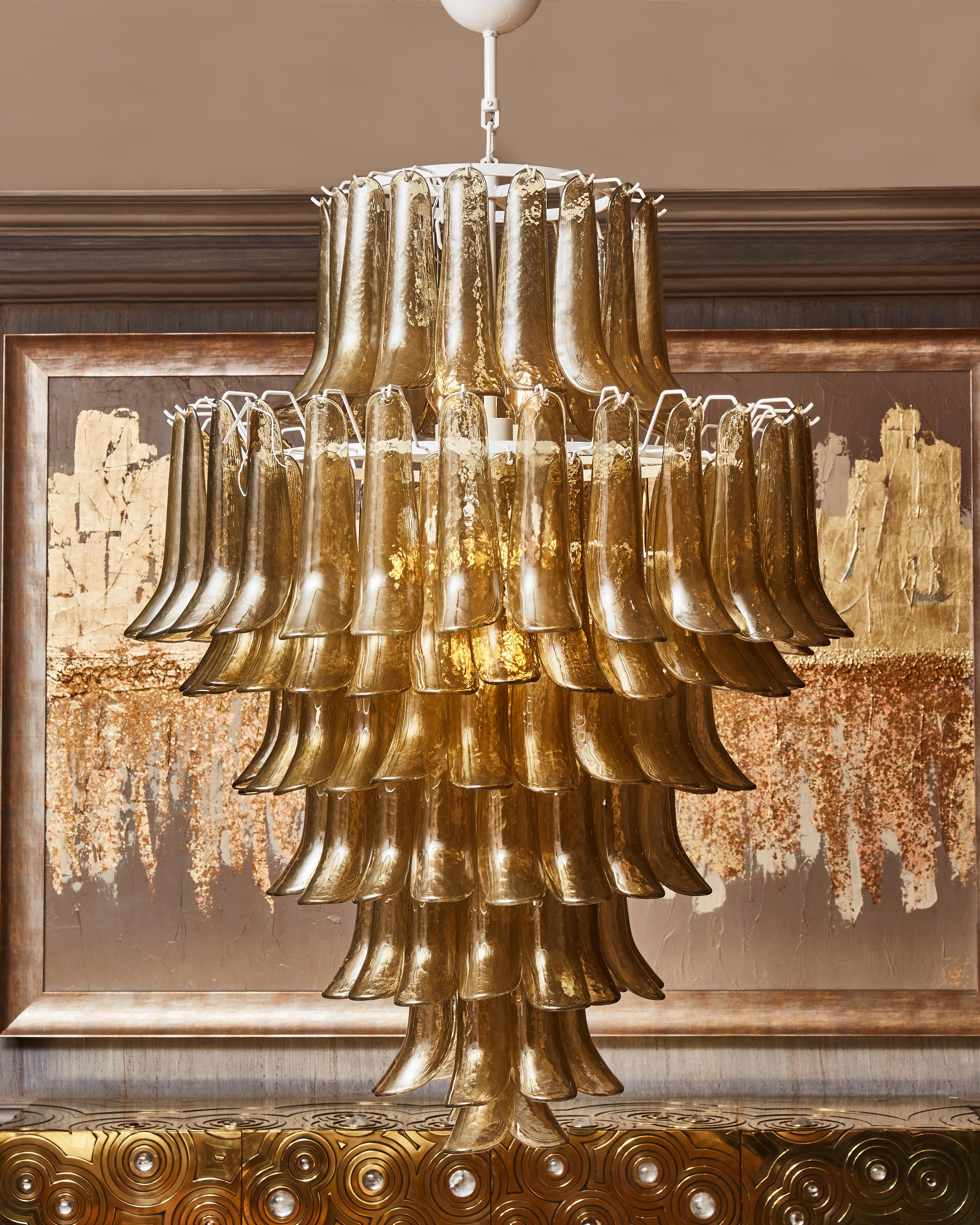 Superb chandelier in white painted metal with amber Murano glasses.
Creation by Studio Glustin.
 