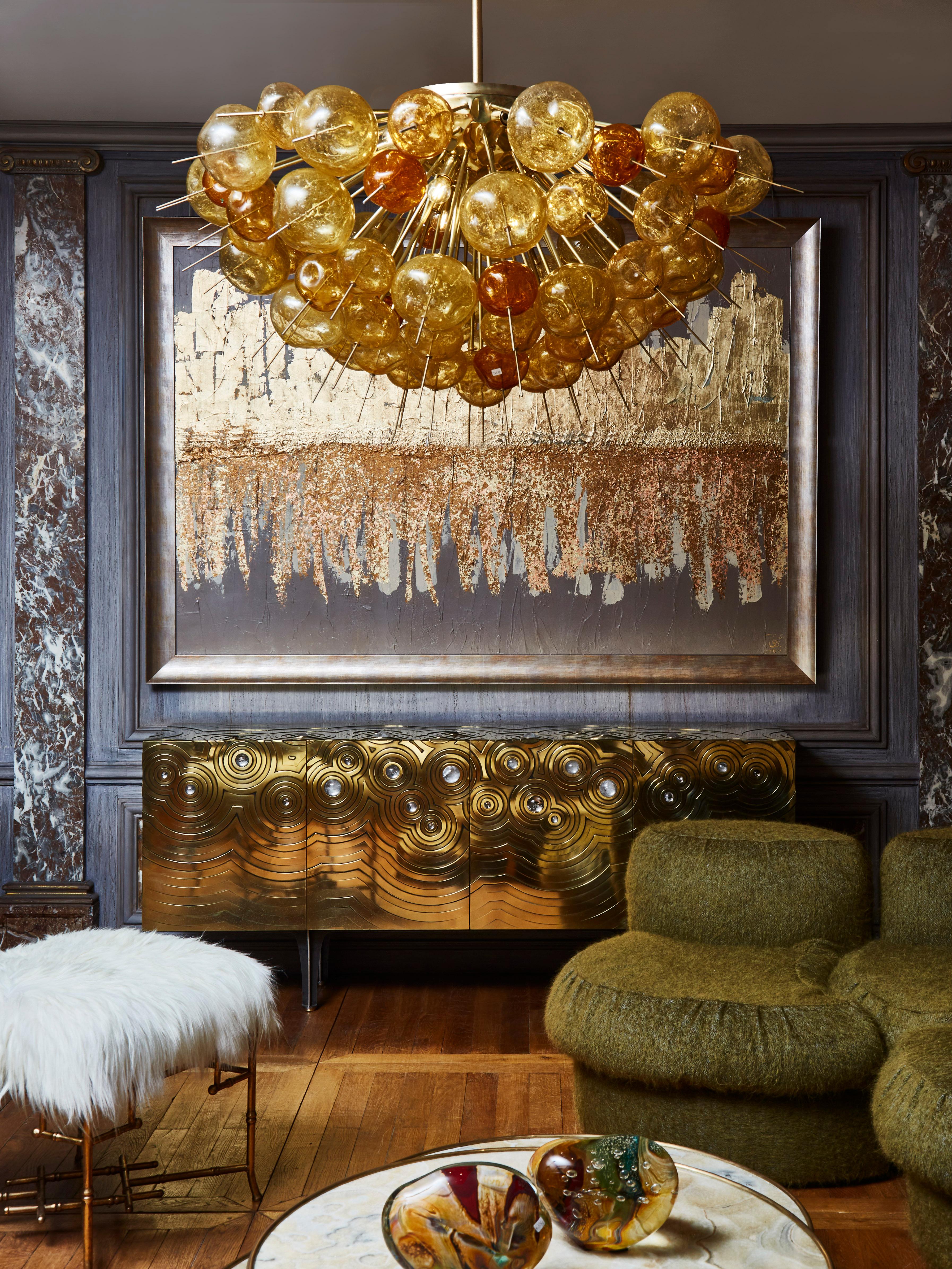 Stunning chandelier in brass with amber tainted and blown Murano glass globes.
Creation by Studio Glustin.
Italy, 2022.