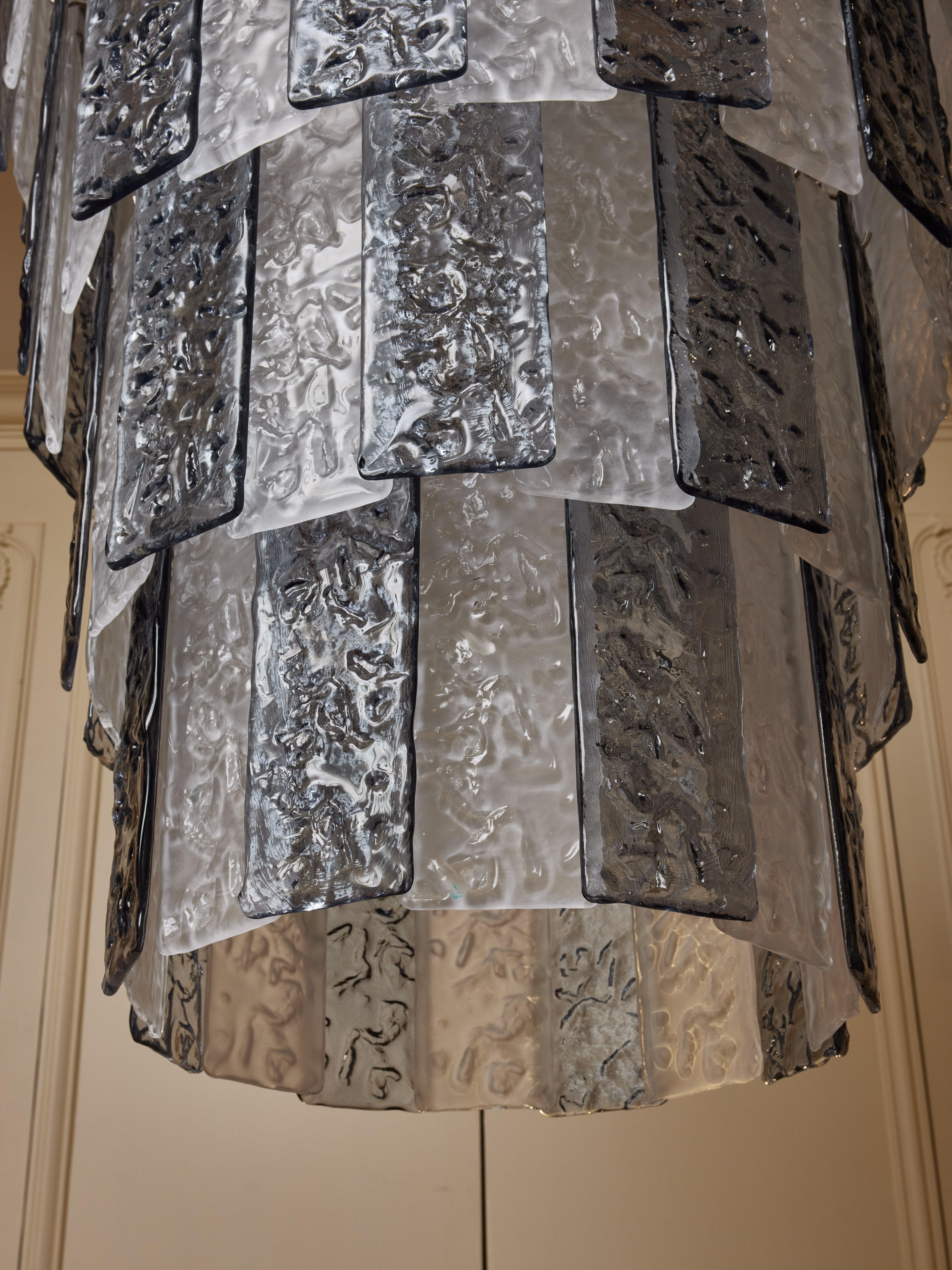 Metal Murano glass chandelier by Studio Glustin. For Sale