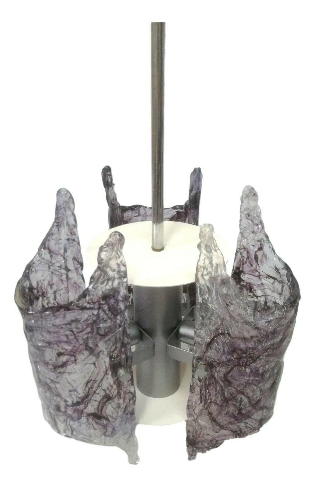 70s chandelier, jt kalmar production, made with a steel and metal structure and three murano glass diffusers, in shades of purple

The height measurement is variable as the central axis can be adjusted according to need, so it can even go beyond