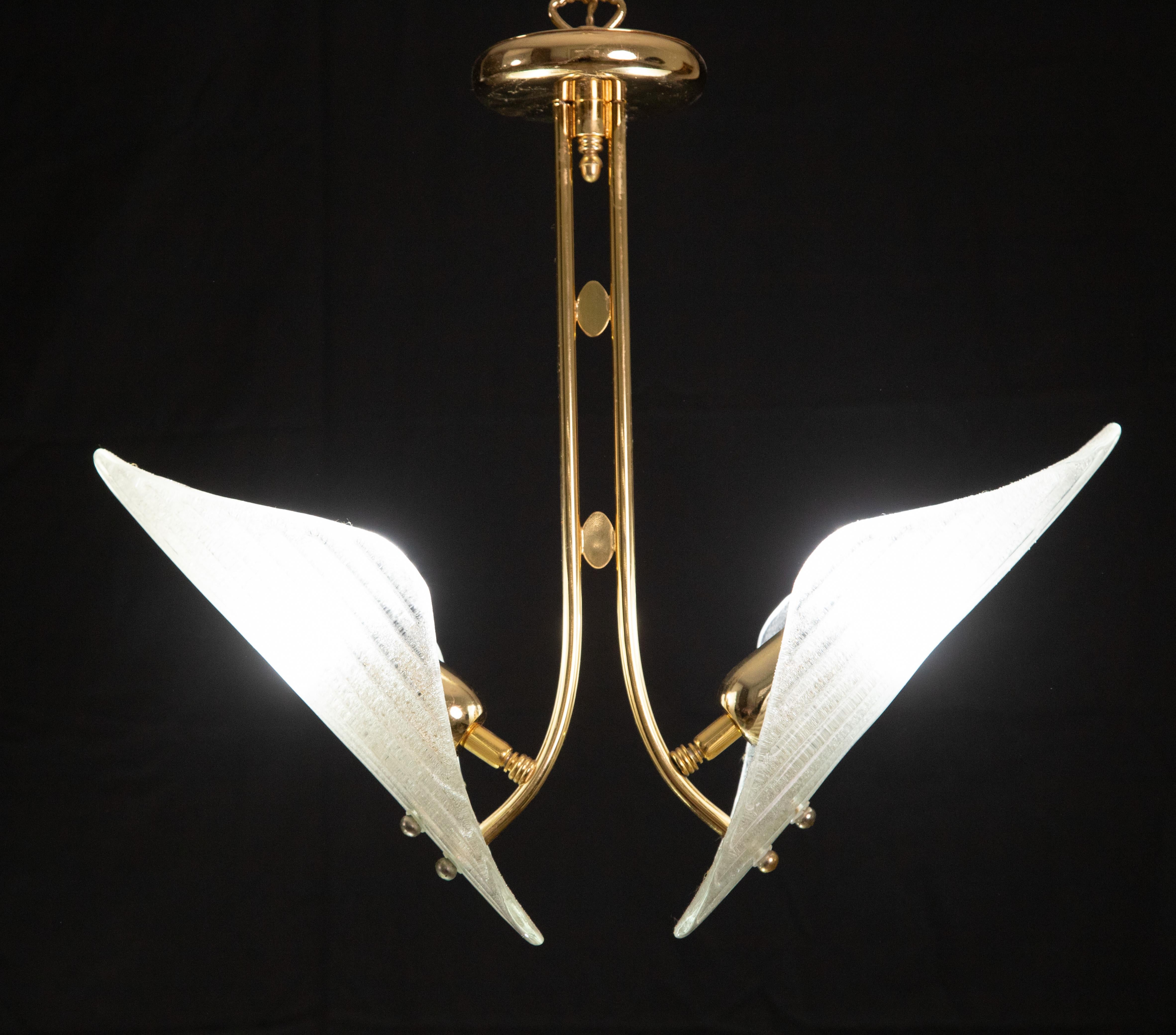 Murano chandelier in the style of Franco Luce.

1970s era.

Gold bath frame.

Excellent vintage condition.