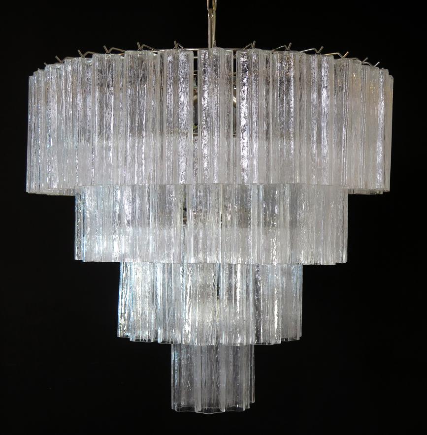 Italian vintage chandelier in Murano glass and nickel plated metal structure on 4 levels. The armor polished nickel supports 78 large amber glass tubes in a star shape.
Period: Late 20th century
Dimensions: 63 inches (160 cm) height with chain;