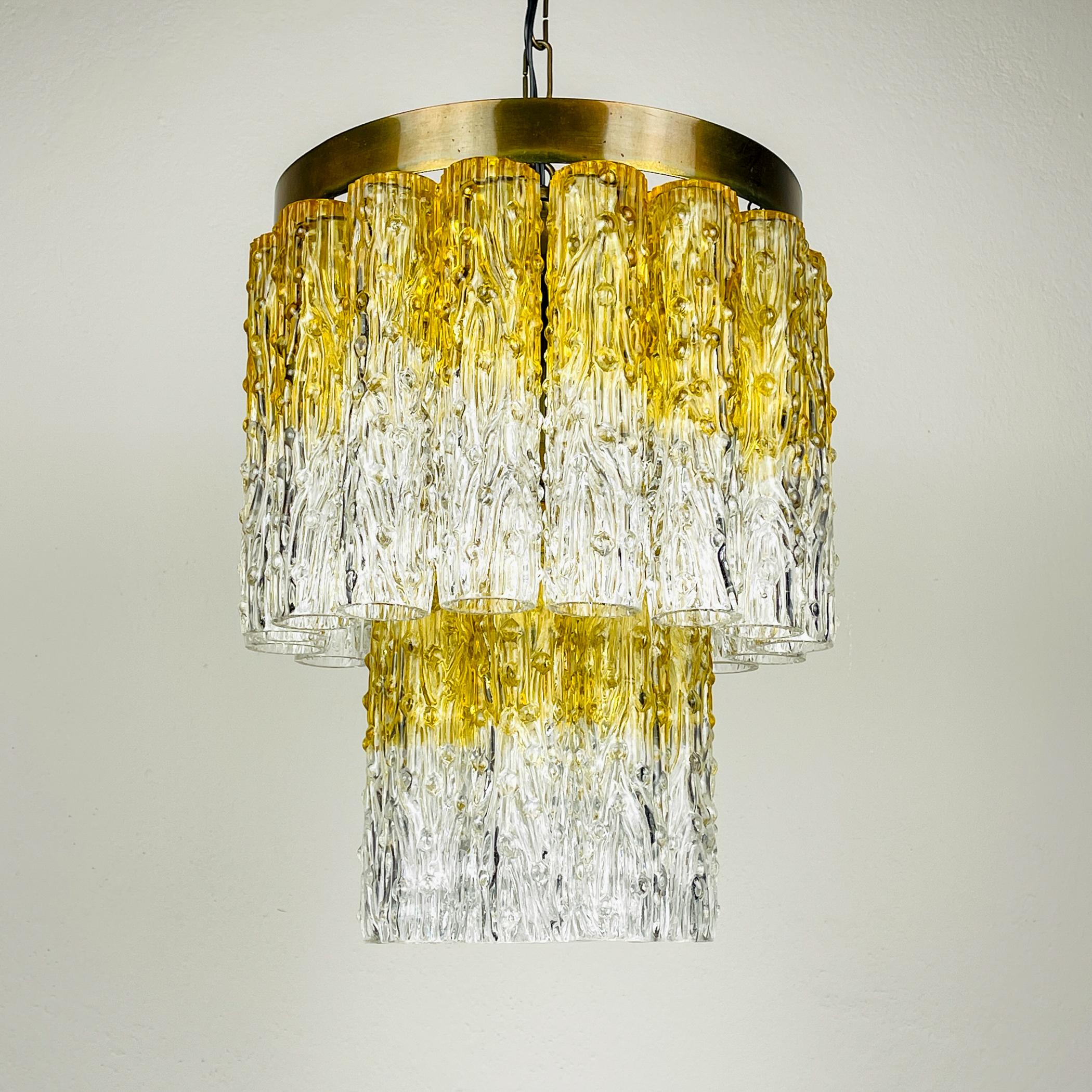 Amazing Murano glass chandelier Tronchi by Toni Zuccheri for Venini made in Italy in the 1960s.
Venini & Co. played a leading role in the revival of Italy’s high-end glass industry, pairing innovative modernist designers with the skilled artisans in