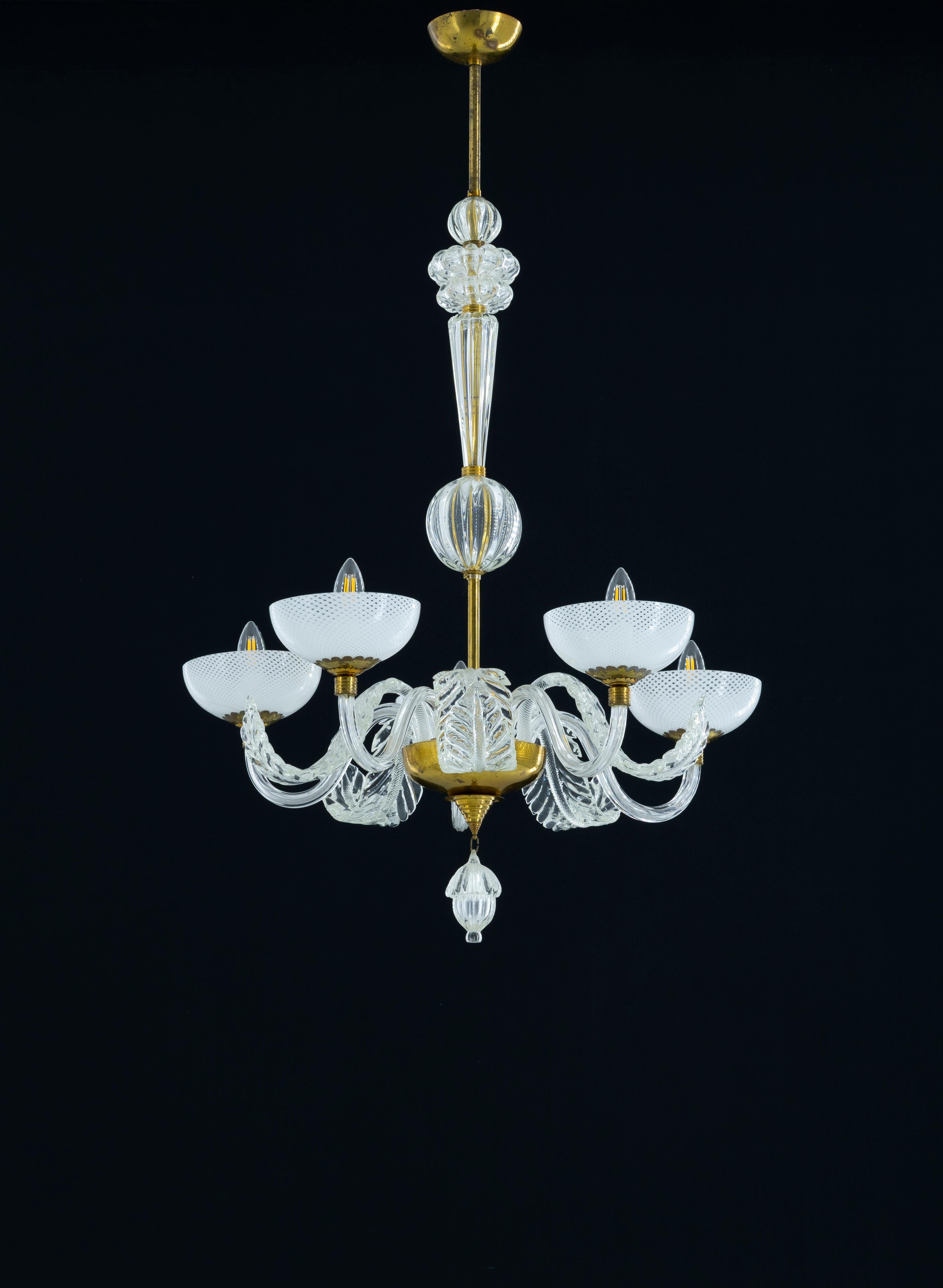 Elegant Antique Murano Glass Chandelier with Delicate White Shades and Gilded Accents.

Presenting a refined and graceful antique Murano glass chandelier, a captivating embodiment of Venetian artistry and timeless elegance. This exquisite piece,
