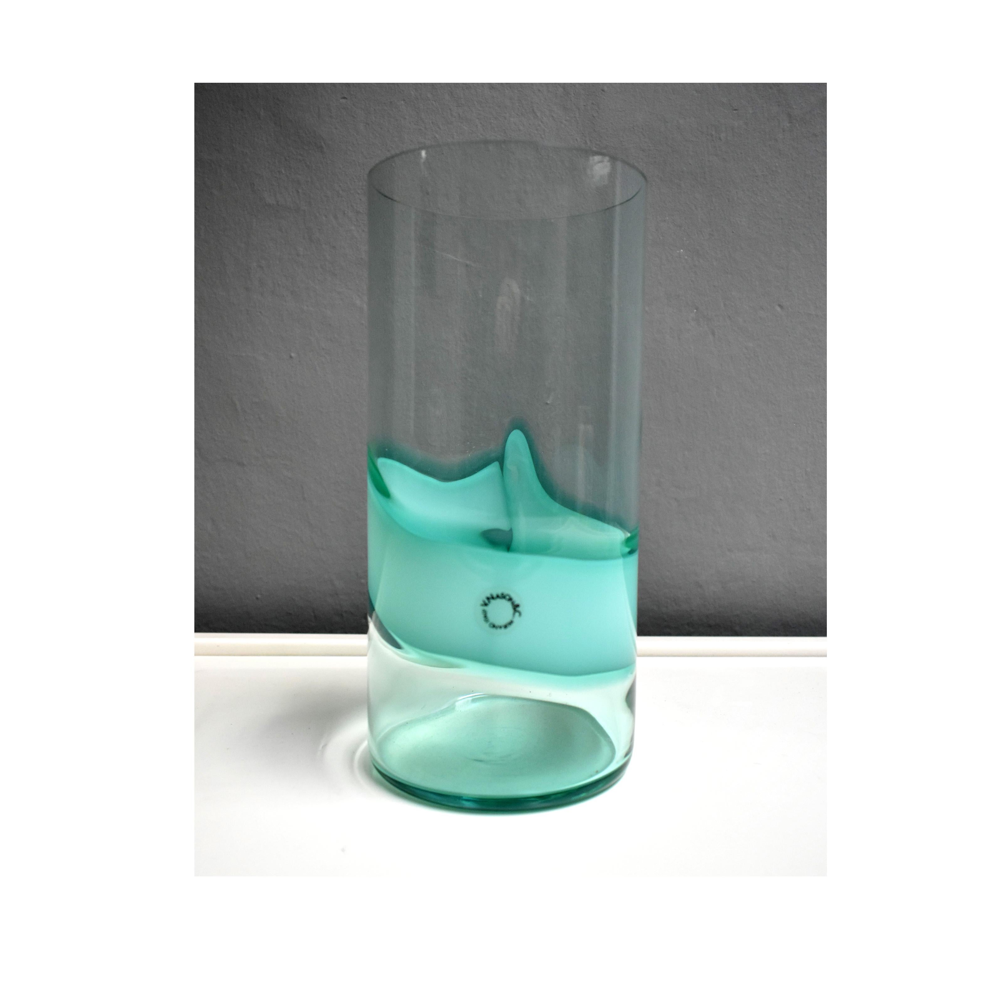 Murano glass vase produced by V.Nason & C
The cylindrical vase in transparent glass and sea water blue has a design on which the authenticity mark is still present
Measures
Dimeter 12cm x 26cm Height
Very Good condition.