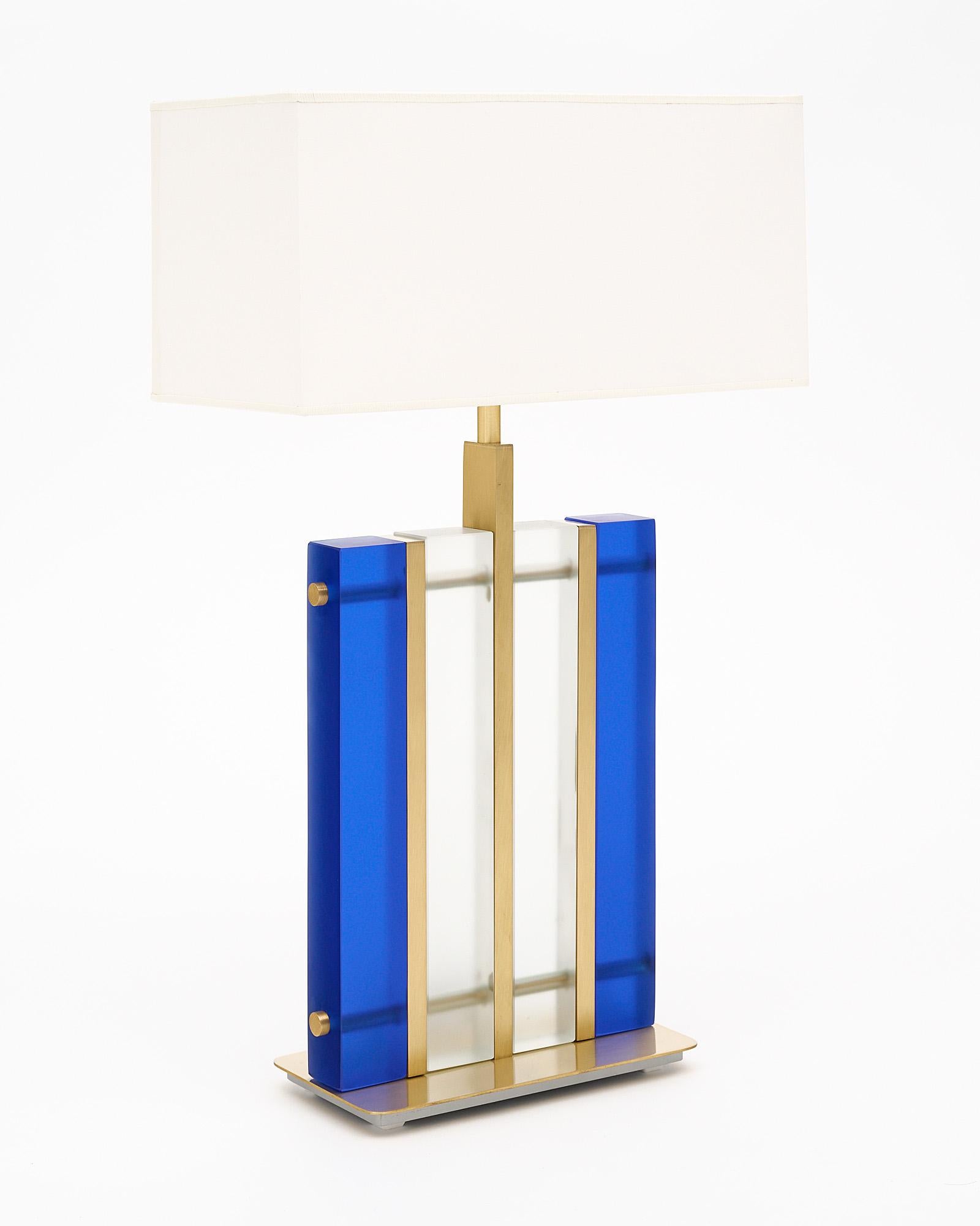 Murano glass cobalt “tormalina” slab lamps with beautiful brushed brass structure. We love the hand-blown slab glass elements in both a frosted clear and frosted cobalt blue hue. These striking, modern fixtures have great impact on a space. They