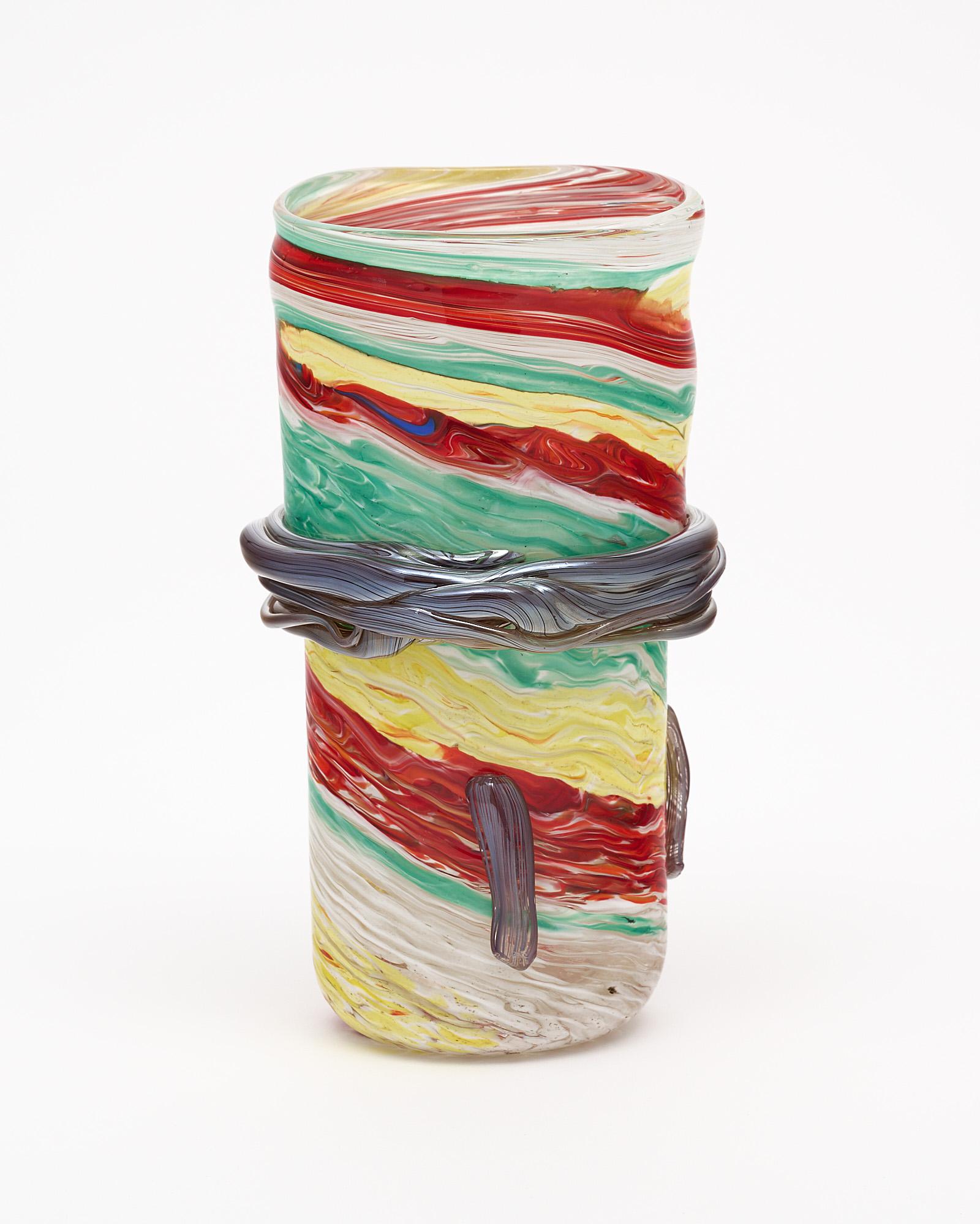 Murano glass vase, Italian, from the Island of Murano. This hand-blown glass piece is made with multicolored glass in red, green, and yellow tones and has an organic movement.