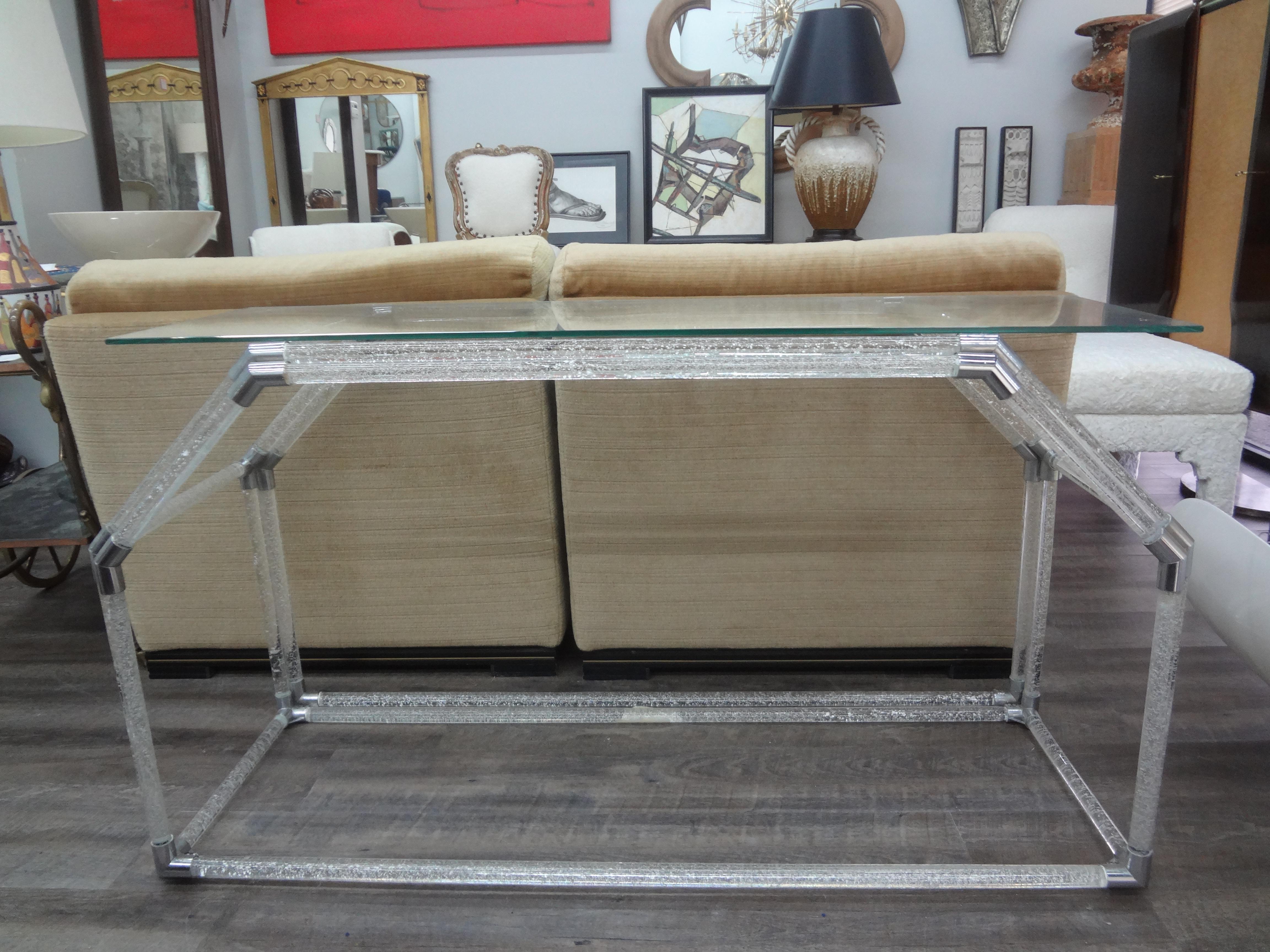 Murano Glass Console Table By Seguso.
This stunning and unusual console table is made of clear Murano glass rods with silver flecks and chrome fittings.
The console dimensions:
54.25 inches console only
51.75 inches including glass top.
This