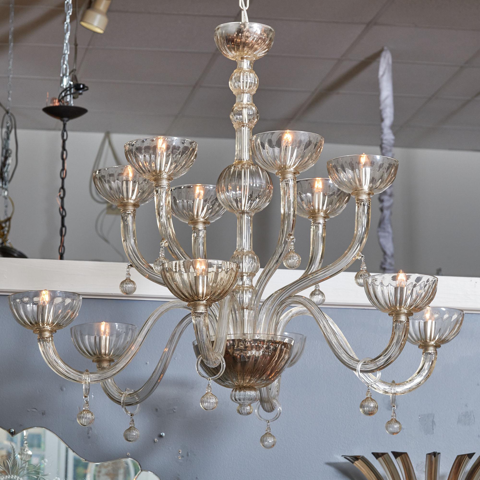 Italian Murano “Cristallo Antico” glass chandelier by Seguso. Beautiful hand blown Murano glass chandelier in a slightly smoked crystal color named “antico