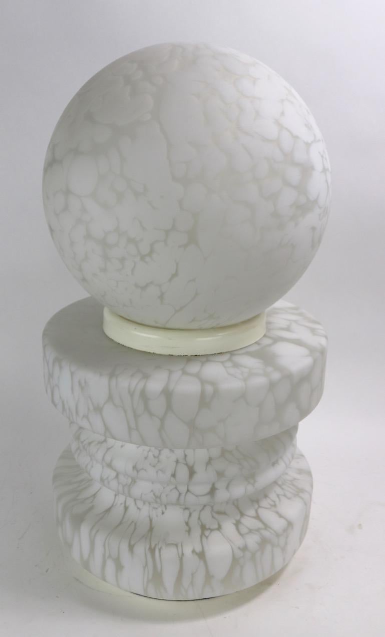 Great example of 1970s Italian Art Glass from the Postmodern period. This lamp has two glass elements each resting on its original fitment base. The interior has an upper socket and the base has two lower smaller sockets to illuminate the top and