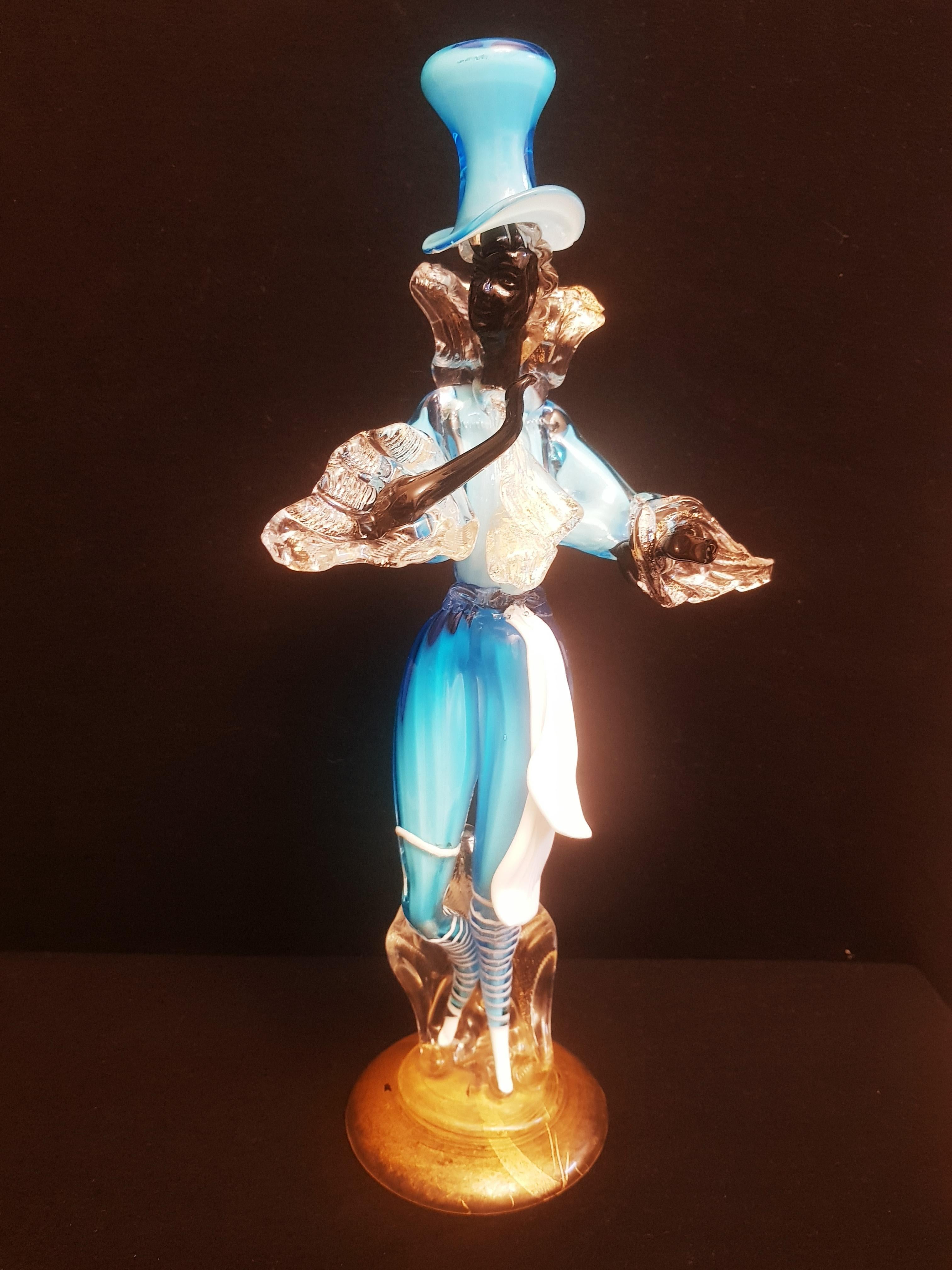 Beautiful vitange Murano glass  dancer in blue, white, clear and black with gold leaf, attributed to Aureliano Toso. In excellent condition.