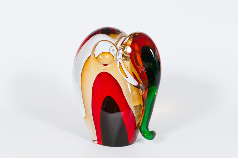 Murano glass elephant sculpture signed by Romano Donà 1990s Multicolor Italy.
This multicolor elephant sculpture is an outstanding piece of the best Venetian glass art, entirely handcrafted in the island of Murano in the 1990s and signed by the