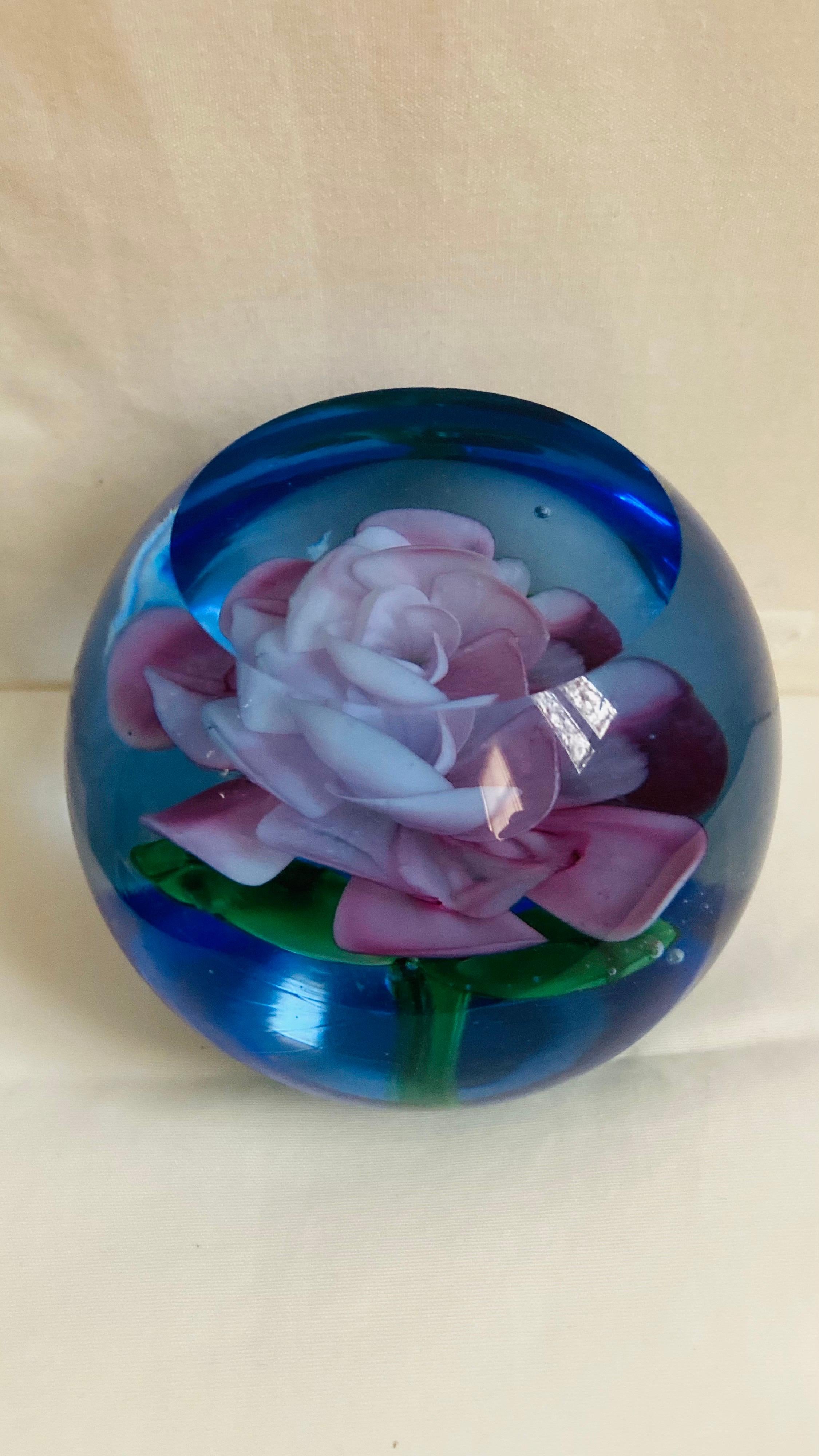 Beautiful murano glass faceted paperweigth blue with flower inside atributed to Archimede Seguso perfect condition.