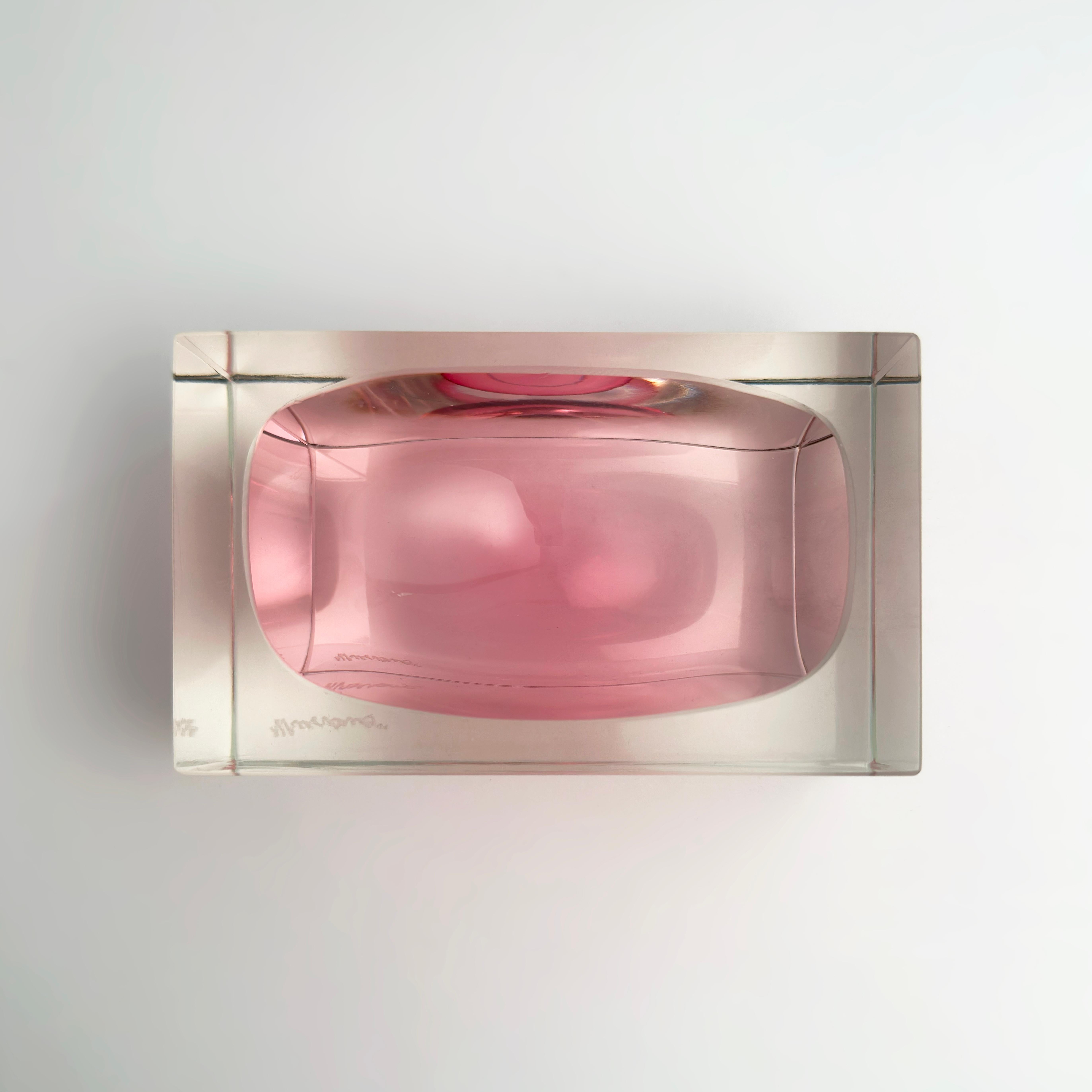 A vintage Murano glass block bowl in a vivid pink hue, attributed to Italian glassmaker Alessandro Mandruzzato and dating to the 1980s. Handcrafted in Murano, Italy, this sculptural piece was made using the sommerso (submerged glass) technique—a
