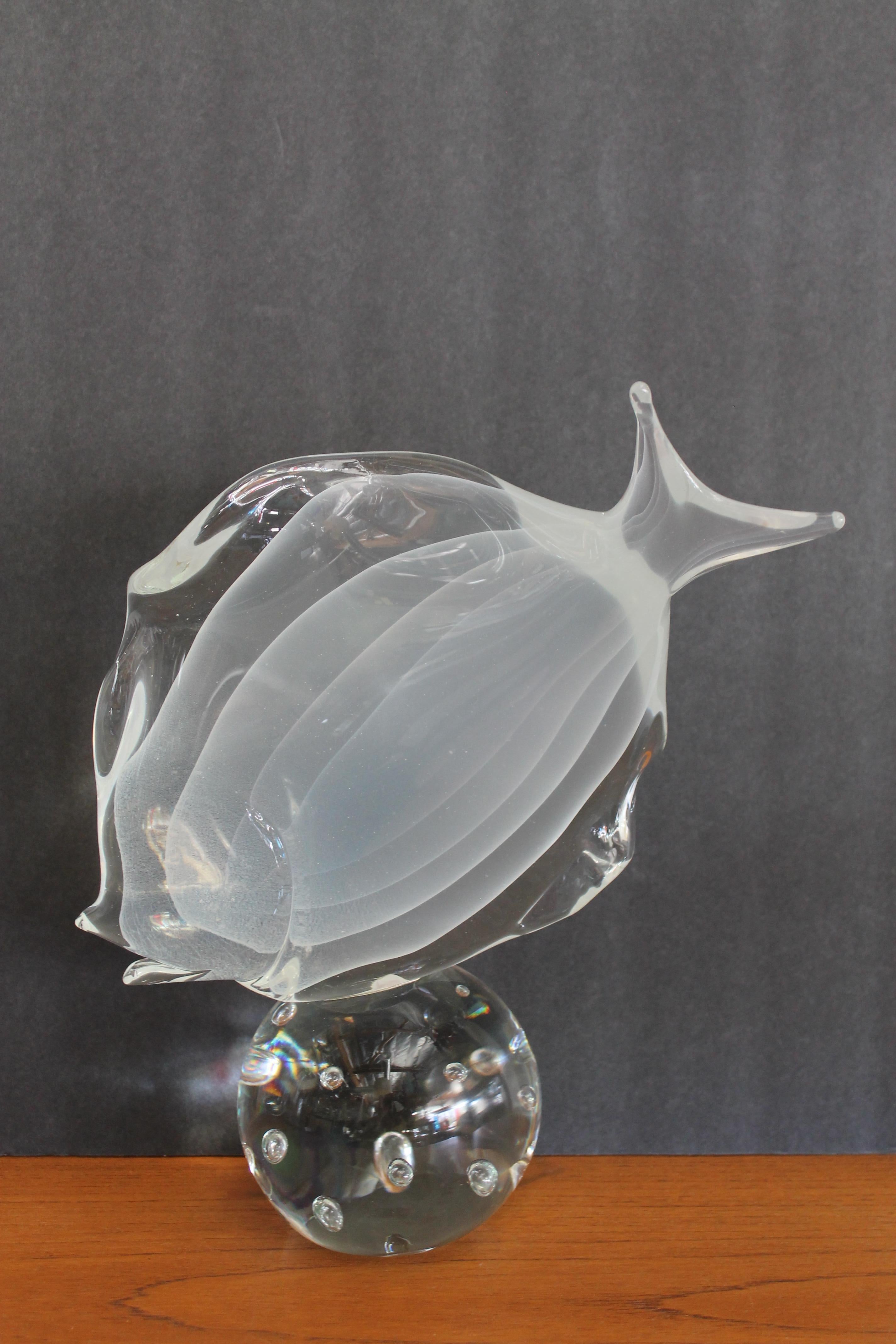 Murano glass fish sculpture by Licio Zanetti. The fish is signed on the bottom and has beautiful layers of opalescent glass. The piece is signed on the bottom. Fish measures 12