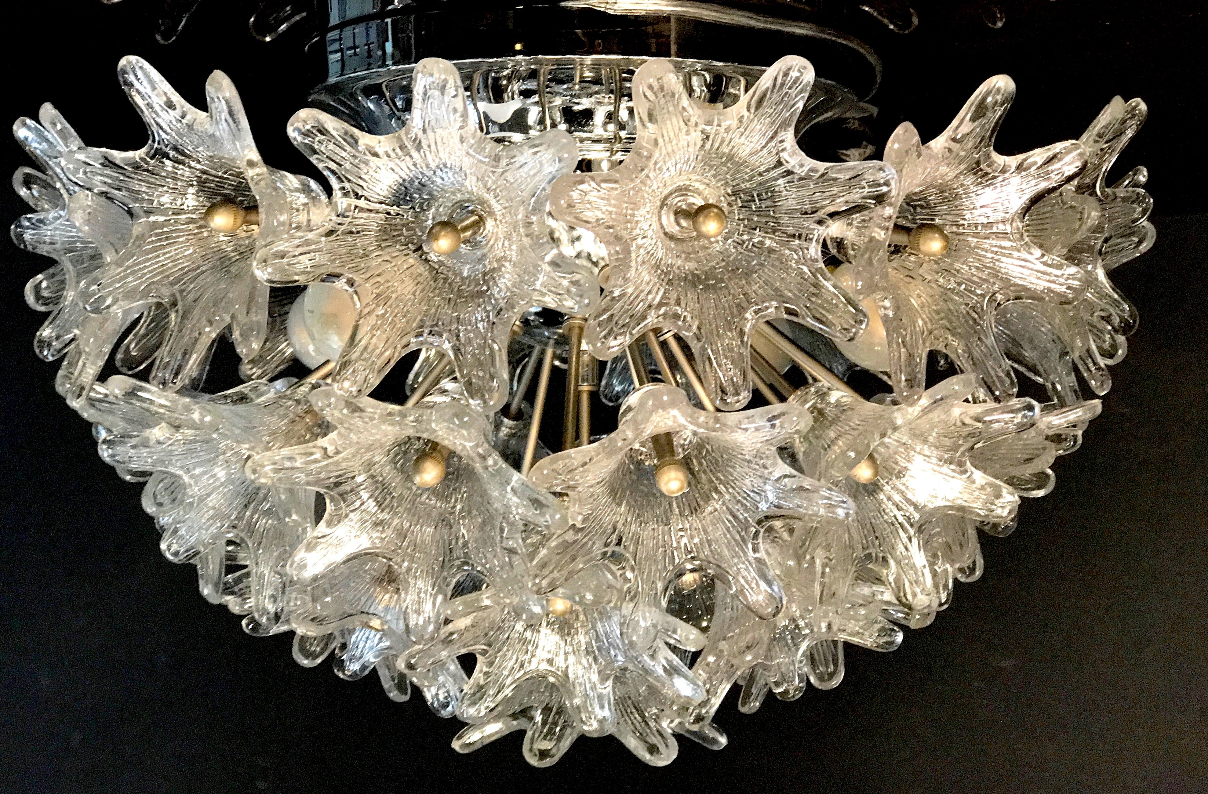 Flush mount Murano glass chandelier by Paolo Venini for VeArt, Italy with 32 clear glass flowers on a chrome Sputnik frame. Amazing eye-catching piece designed in the 1960s, Italy. The lamp takes four E 14 bulbs. 4W.