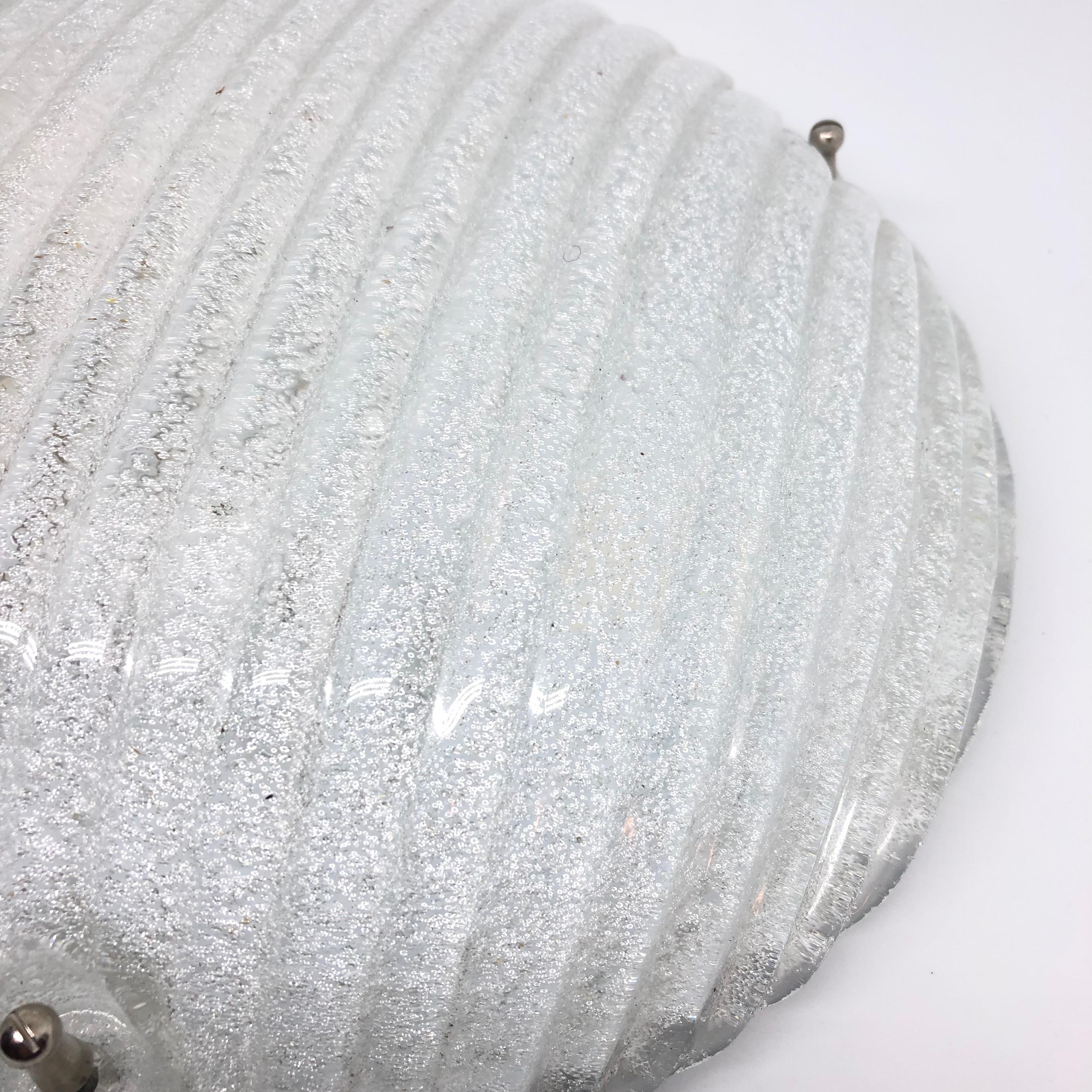 A beautiful flush mount ceiling light. Made in Austria by Eglo Leuchten. Gorgeous textured glass flush mount with metal fixture. The glass has a very cute design. The fixture requires two European E27 / 110 Volt Edison bulbs, up to 60 watts each.