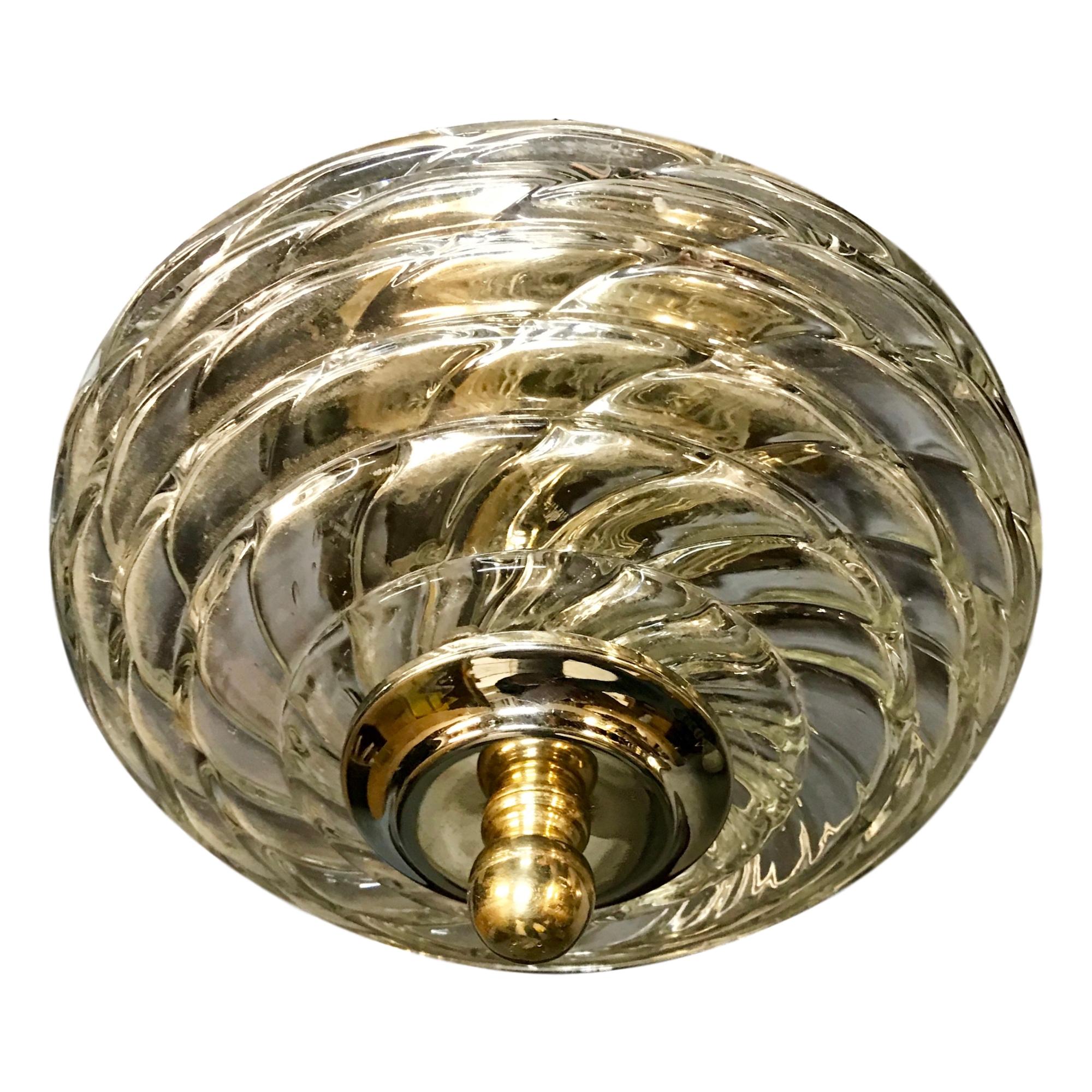 A circa 1950s Murano glass flushmount ceiling fixtures with interior light.

Measurements:
Drop 6