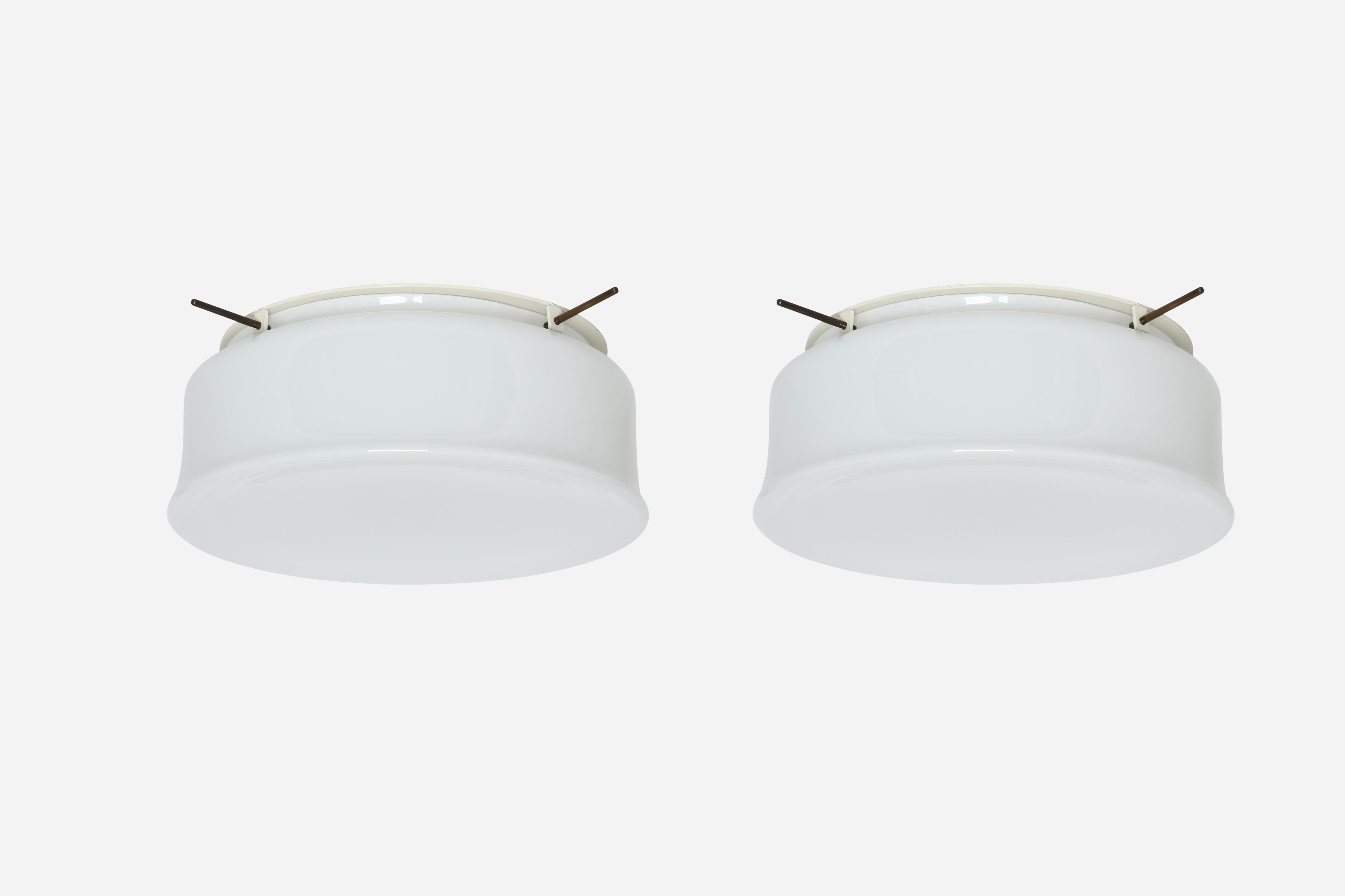 Murano glass flush mount ceiling light by Vistosi, attributed.
Glass is possibly made by Vistosi, metal frame is new and custom made.
Designed and made in Italy.
White opaline glass, enameled metal.
Takes 3 Edison bulbs.
Complimentary US rewiring