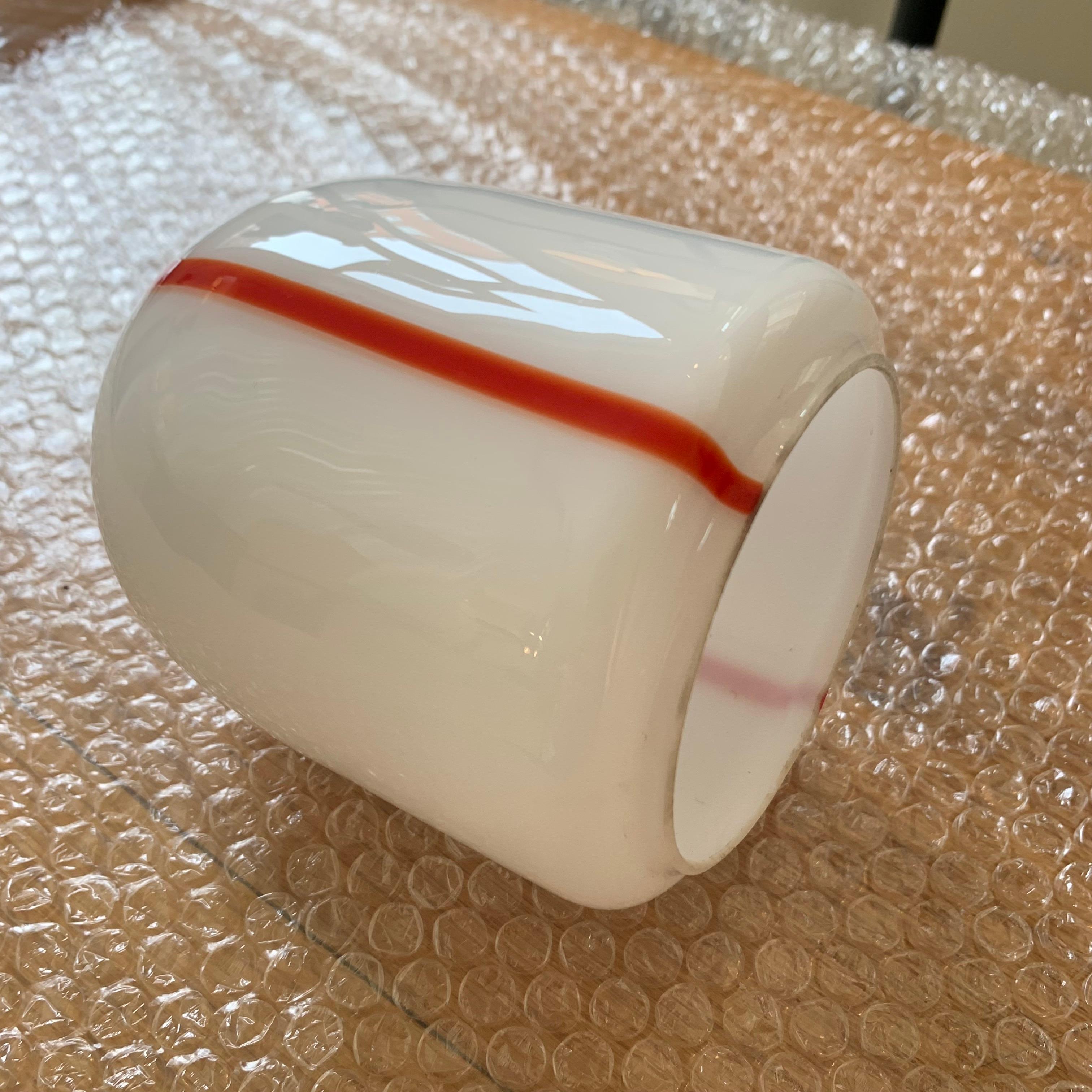  Murano glass element for a sconce Din Linea model, Renato Toso for Leucos, circa 1972, Italy.
White Murano glass with red line.
Dimensions: 13 cm deep, 11 cm diameter.
All purchases are covered by our Buyer Protection Guarantee.
This item can be