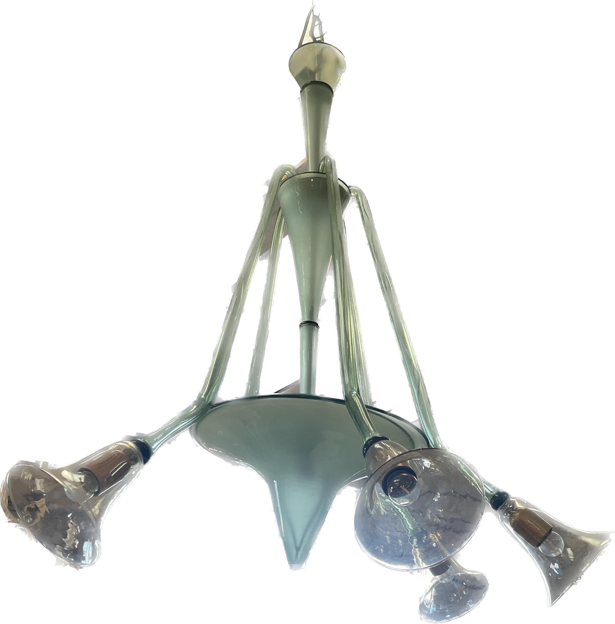 This Murano pendant is a beautiful color of pale celery green. It has 5 arms and will give any room that added look of chic design.
Dimensions are 35 w x 41 t