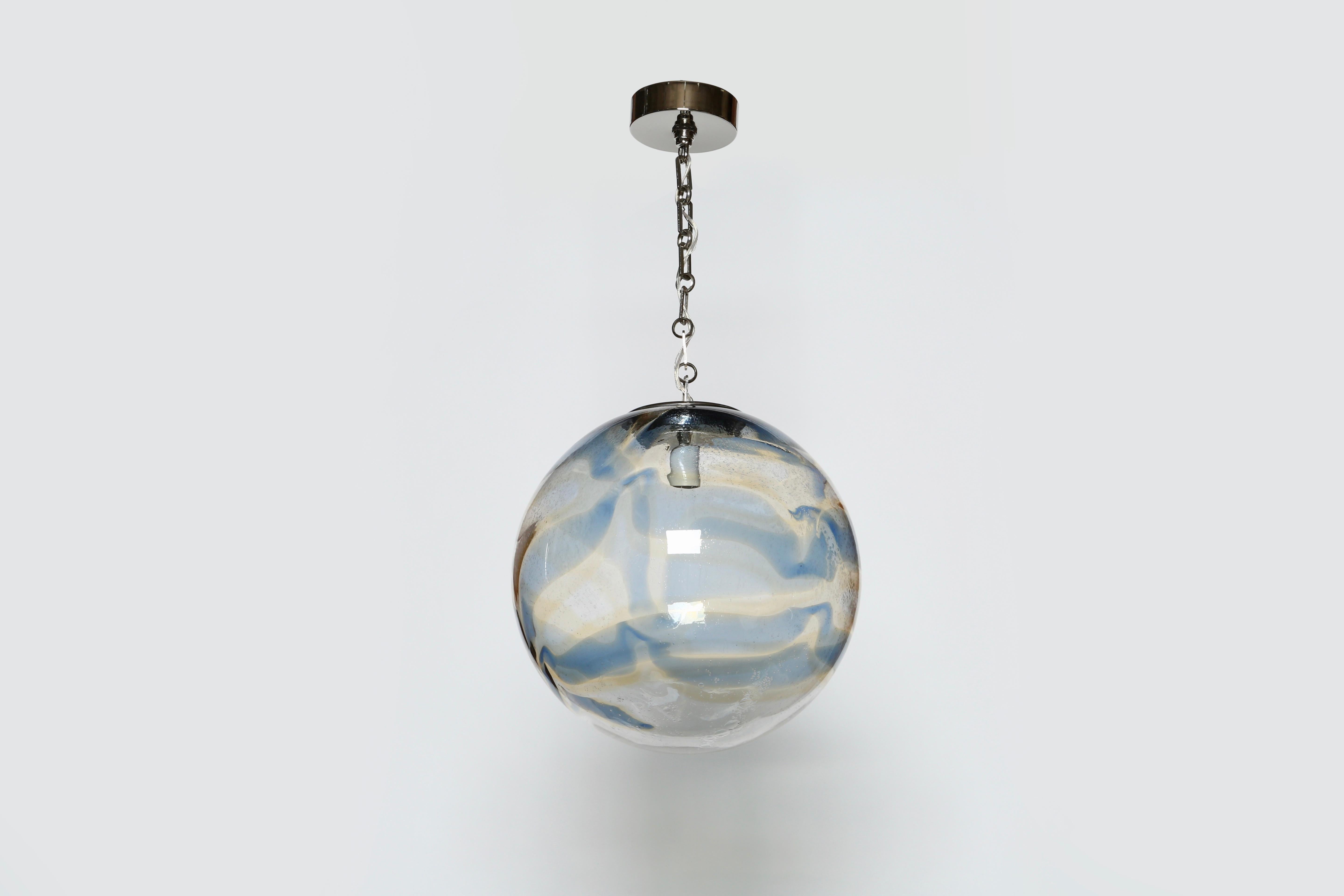 Murano glass globe ceiling pendant.
Italy, 1970s.
Hand blown glass, nickel-plated metal.
 