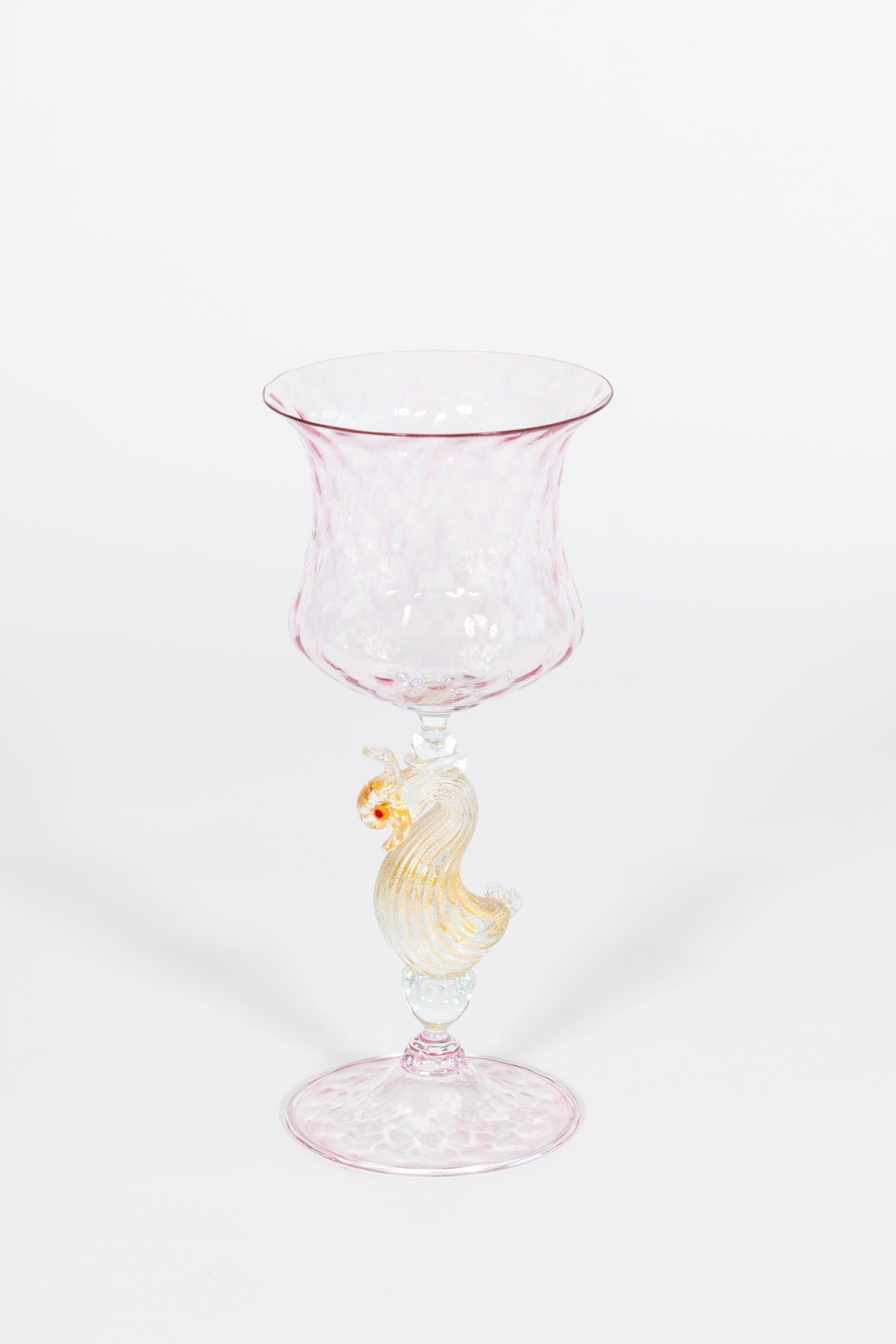 This exquisite Murano glass goblet is a prime example of the exceptional artistry from the renowned Venetian island, dating back to the 1980s. A testament to generations of glassmaking tradition, this piece showcases the delicate and intricate