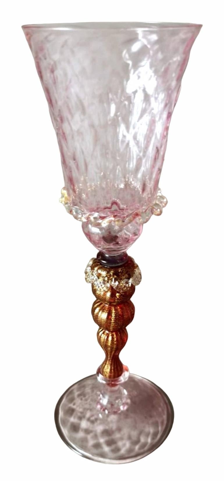 We kindly suggest that you read the entire description, as with it we try to give you detailed technical and historical information to guarantee the authenticity of our objects.
Exceptional hot-blown Murano glass goblet; it has a stem worked with