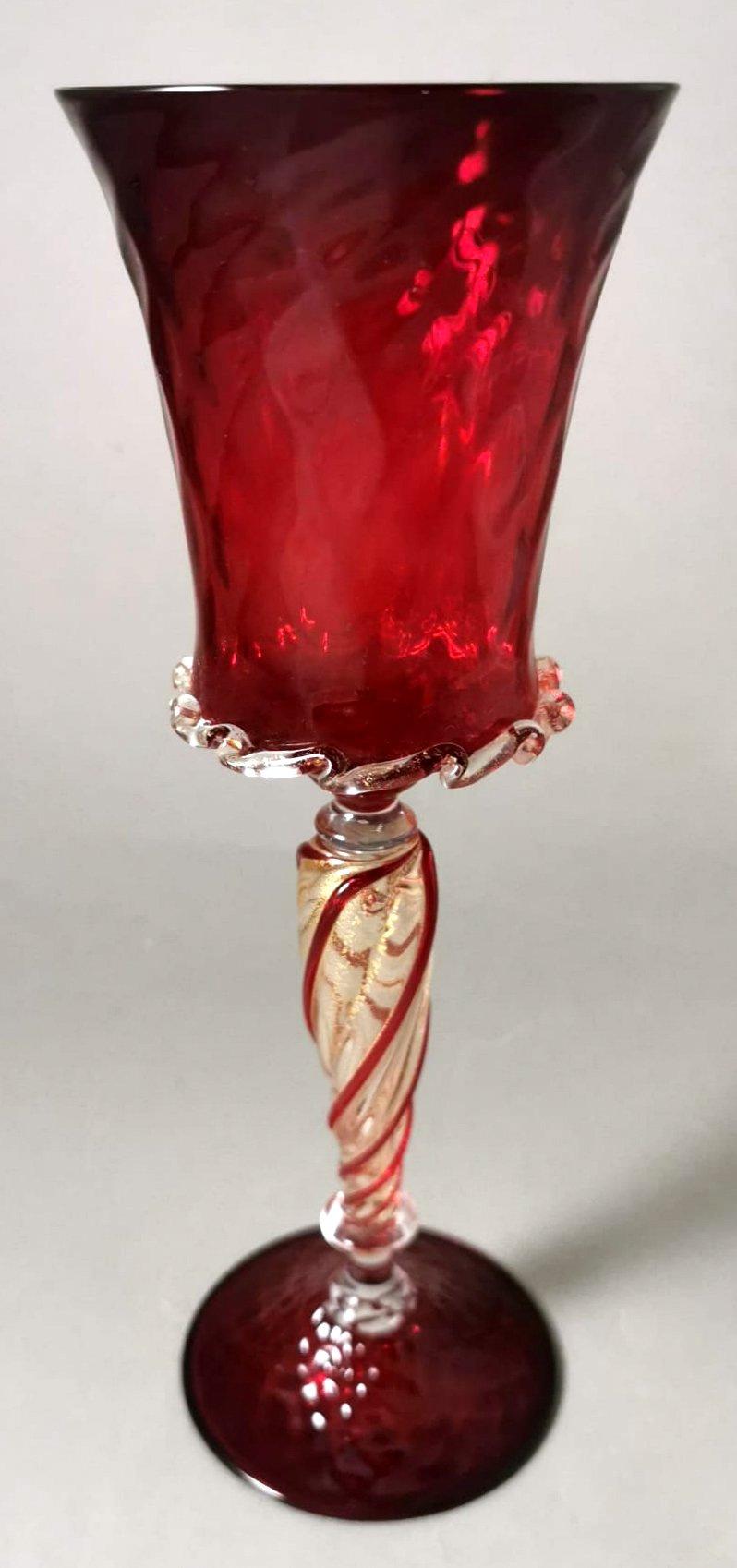 We kindly suggest that you read the entire description, as with it we try to give you detailed technical and historical information to guarantee the authenticity of our objects.
Exceptional hot-blown Murano glass goblet; it has a rare stem worked