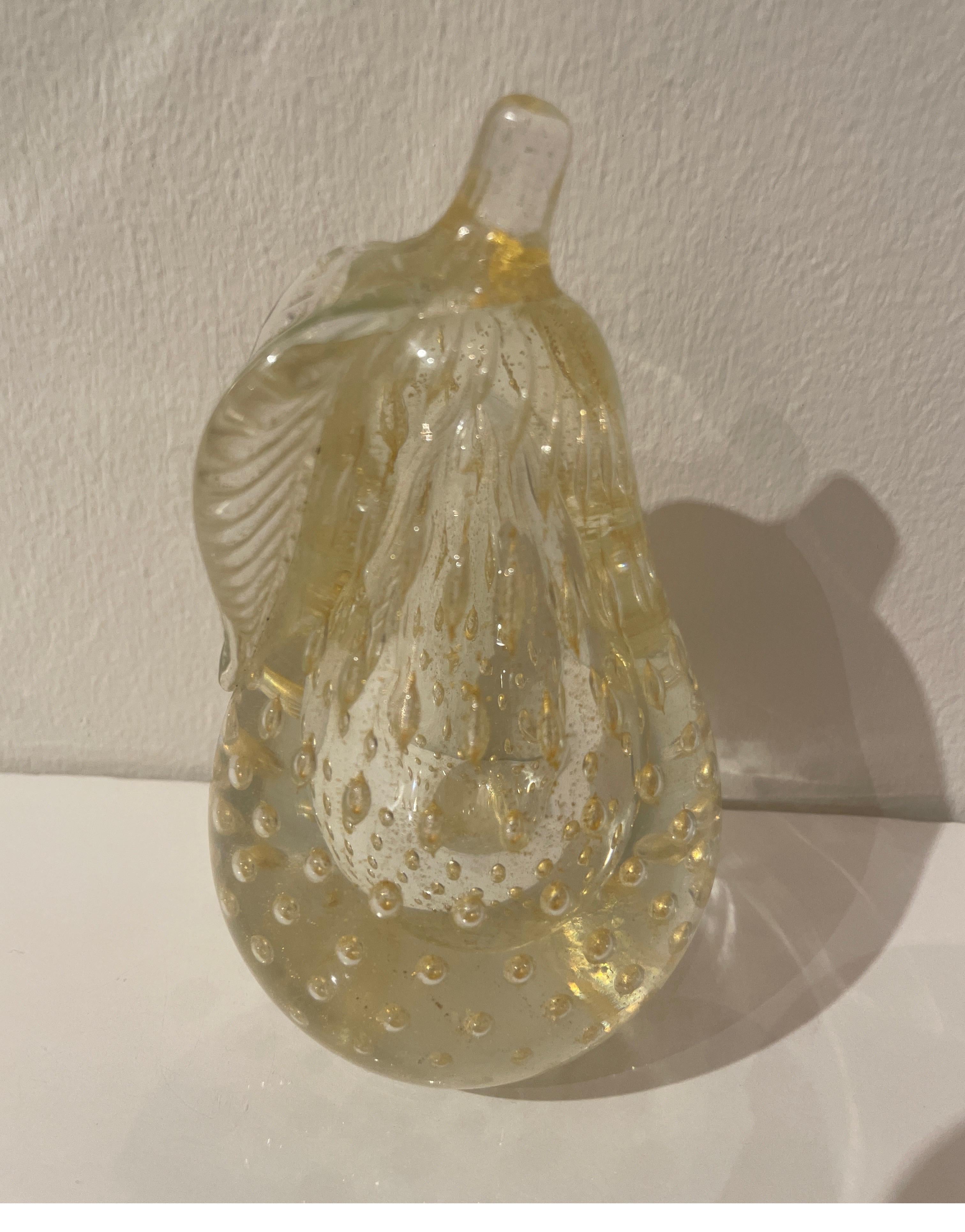 Charming gold speckled Murano glass pear paperweight. Striking design of controlled bubbles throughout.