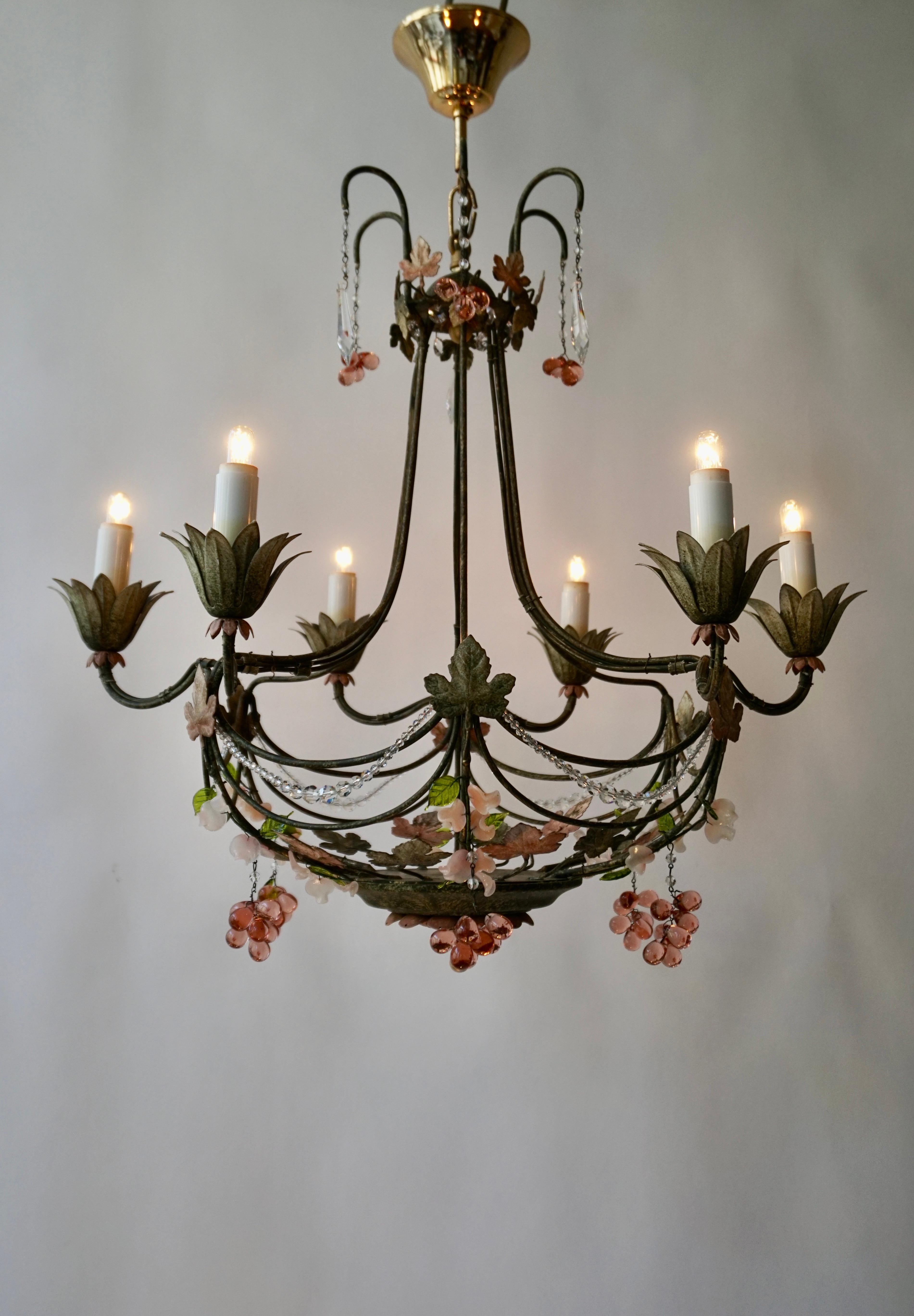 Italian Venetian metal painted 6-light chandelier with Murano glass grapes and leaves from the 1970s.

The light fixture is in complete working order, but as with all vintage or antique lighting, we would always suggest it is tested and fitted by a