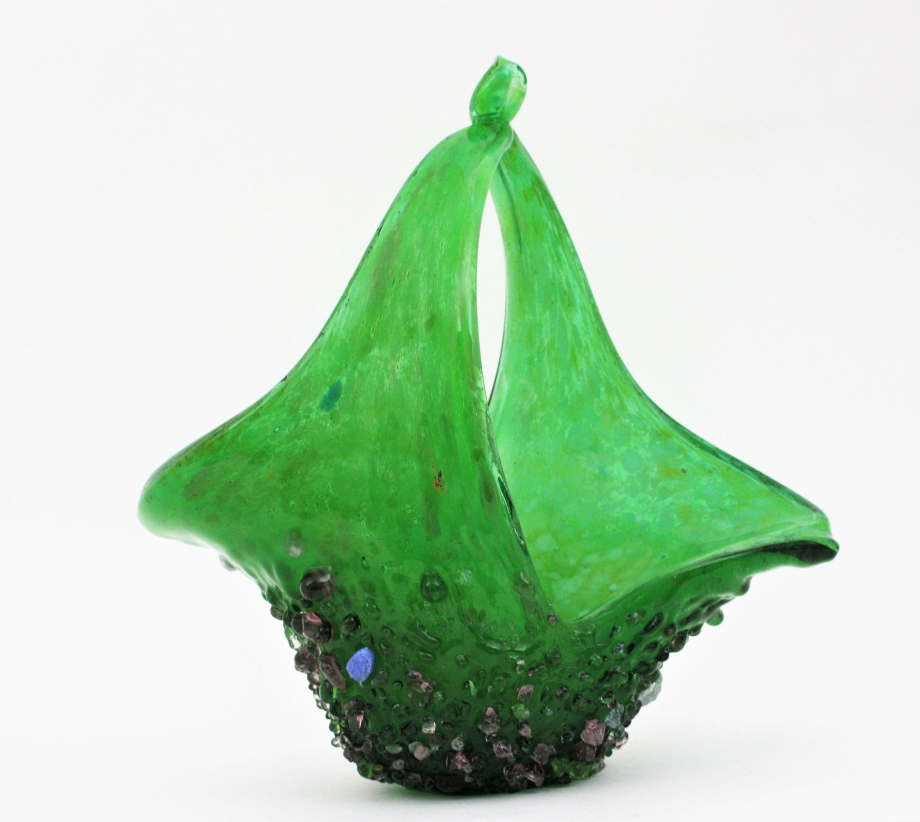Murano Art Glass Basket Centerpiece Vase. Italy, 1950s.
An unique and exceptional Murano art glass centerpiece in shades of green with applied multicolor glass drops. 
Finely executed in handblown glass with murrine decorations thorough. At the