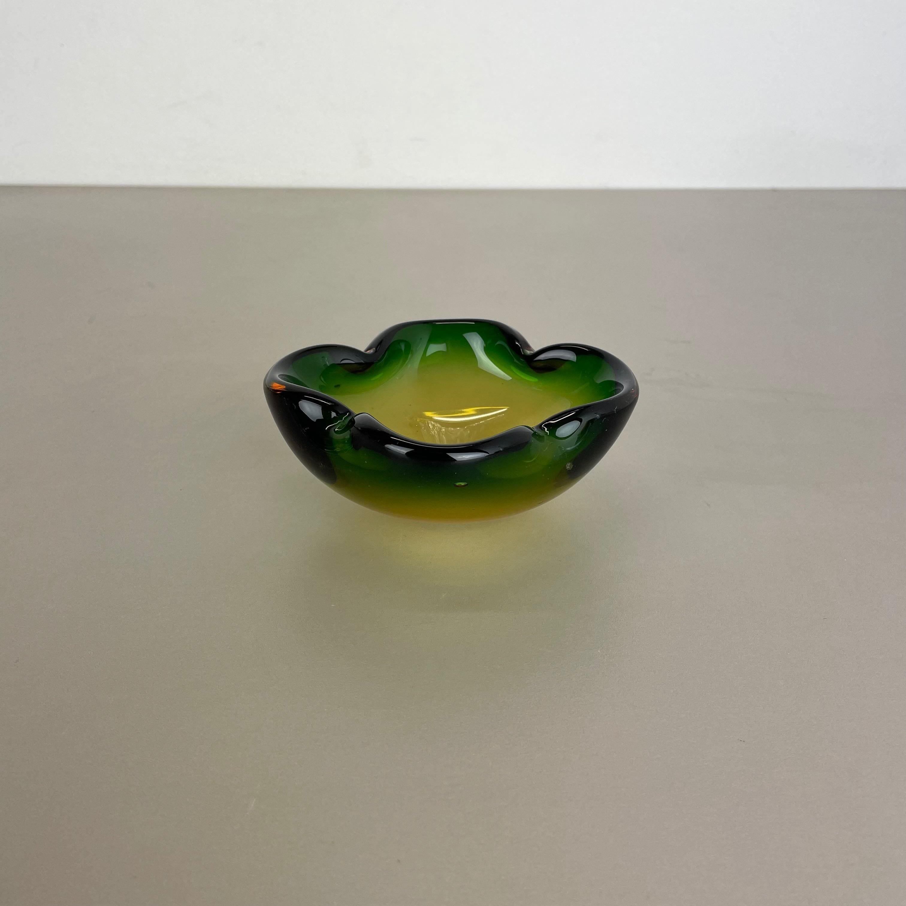 Article:

Murano glass bowl, ashtray element


Origin:

Murano, Italy


Decade:

1970s



This original vintage glass bowl element, ash tray was produced in the 1970s in Murano, Italy. It is made in Sommerso technique and has a
