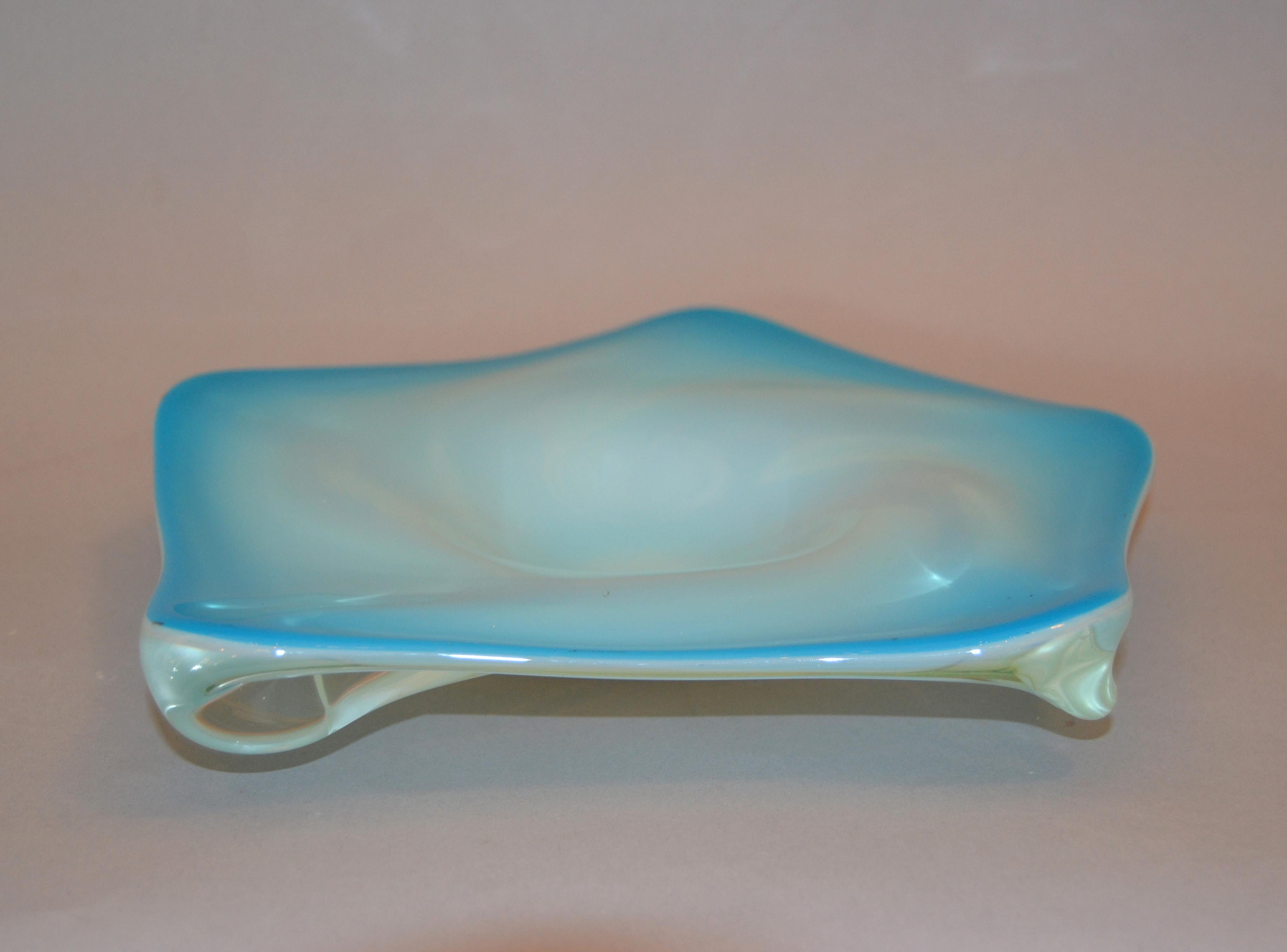 Murano glass hand blown light blue, white and clear decorative bowl, catchall from Italy.
No markings.
Simply beautiful.