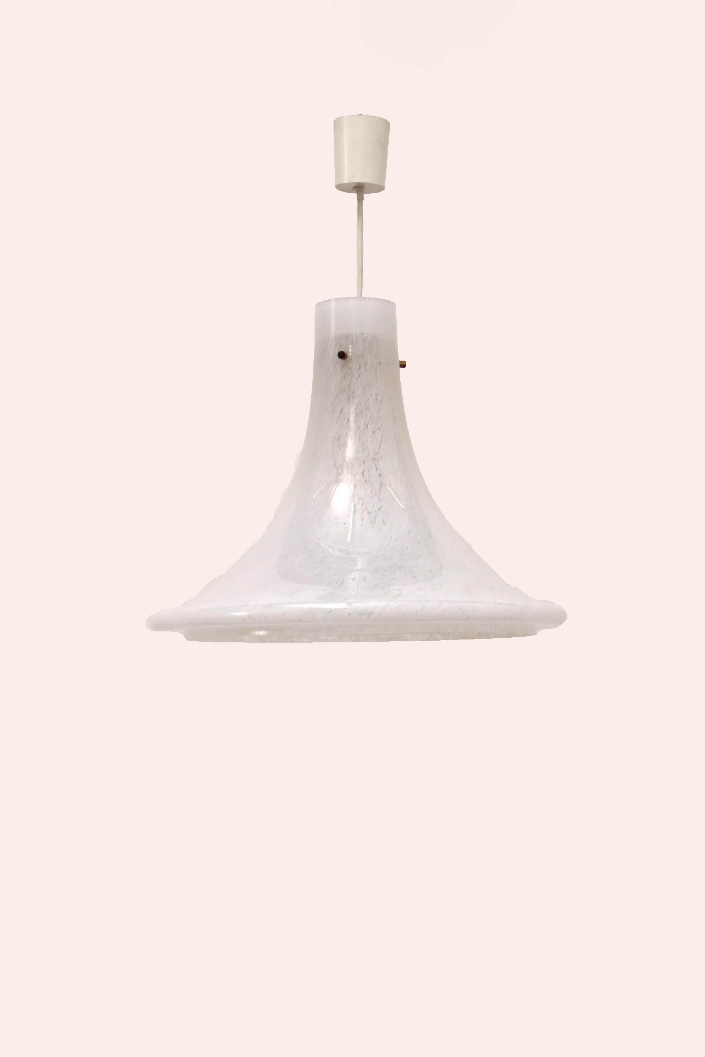 This Murano glass pendant lamp was designed in the 1970s. It was produced by Glashütte Limburg in Germany. The light is beautifully filtered through the Murano glass. The Murano glass hanging lamp has a minimalist design. The condition of this