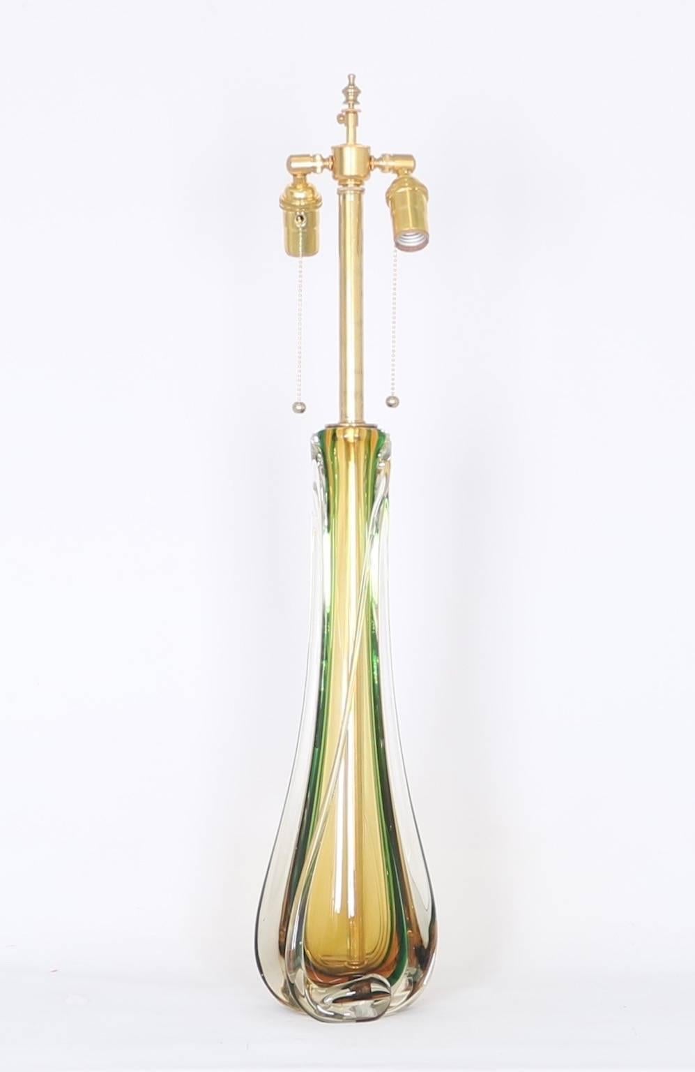 Seguso lamp produced in Murano Glass from the 1950s. Crafted in Sommerso style with clear, green and amber details. Fully restored with new wiring and hardware including a double socket cluster. Wear appropriate to age and use the piece is in