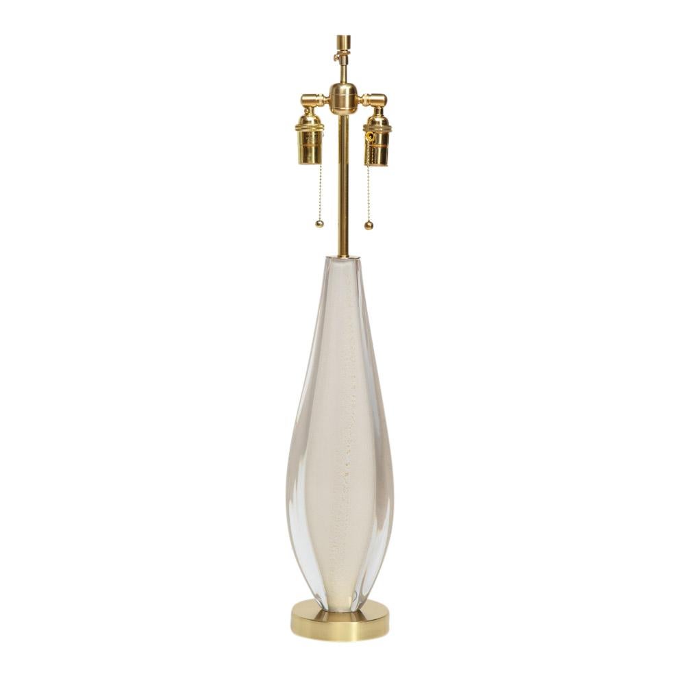 Flavio Poli Sommerso lamp, gold, glass, Murano. Teardrop form glass lamp in gold and clear with internal gold flakes. Mounted on 5 inch x 1.5 inch brass base. Glass only measure 19 inches. Lamp shade is sold with the lamp and measures: 11.5 inches H