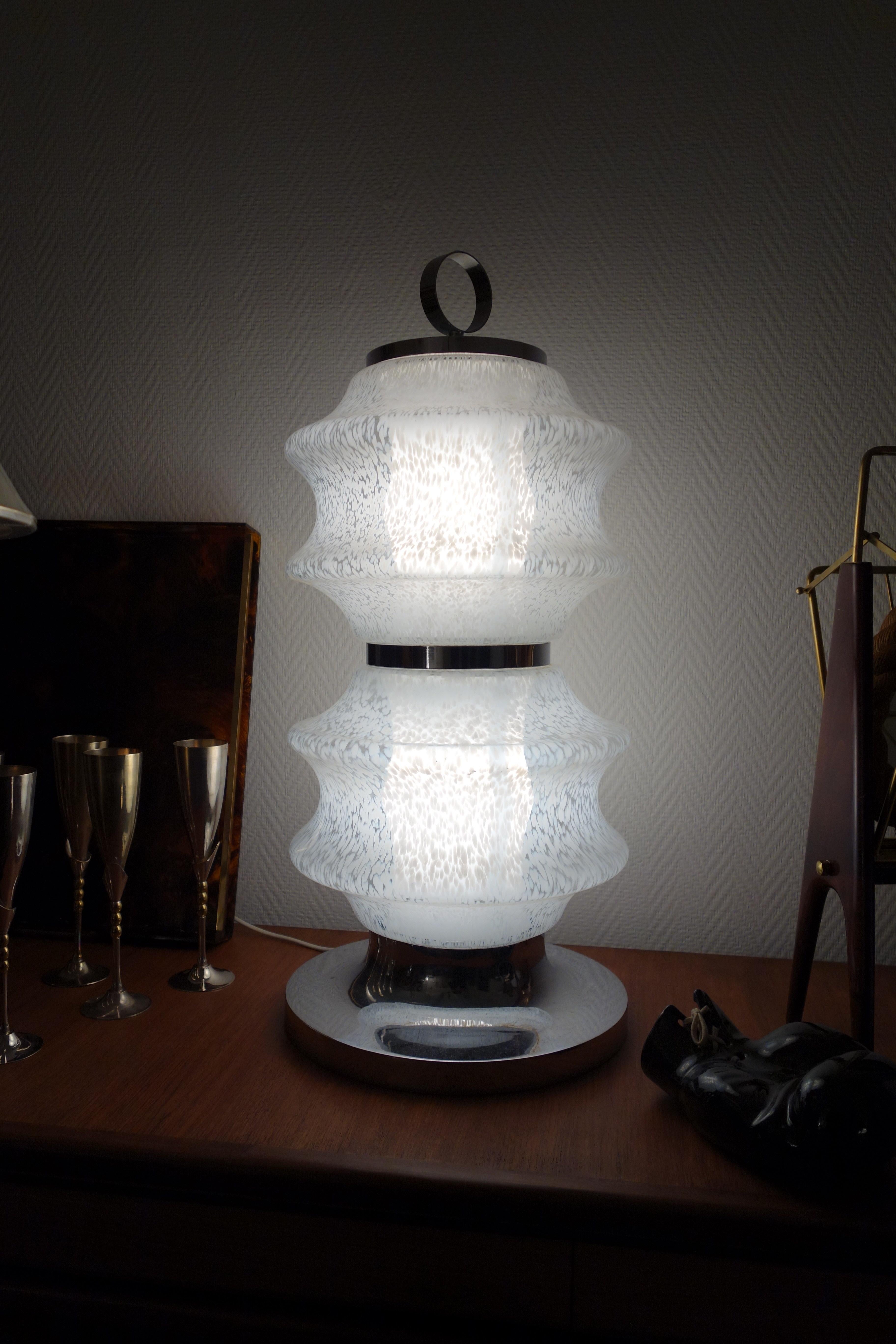 Italian lamp in Murano blown glass from the 1970s. Chrome frame, 2 outer pieces in speckled glass and 2 inner pieces in opaline bamboo form. Screw socket. In perfect condition, presence of some scratches of use. Use as a mood lamp or floor lamp,