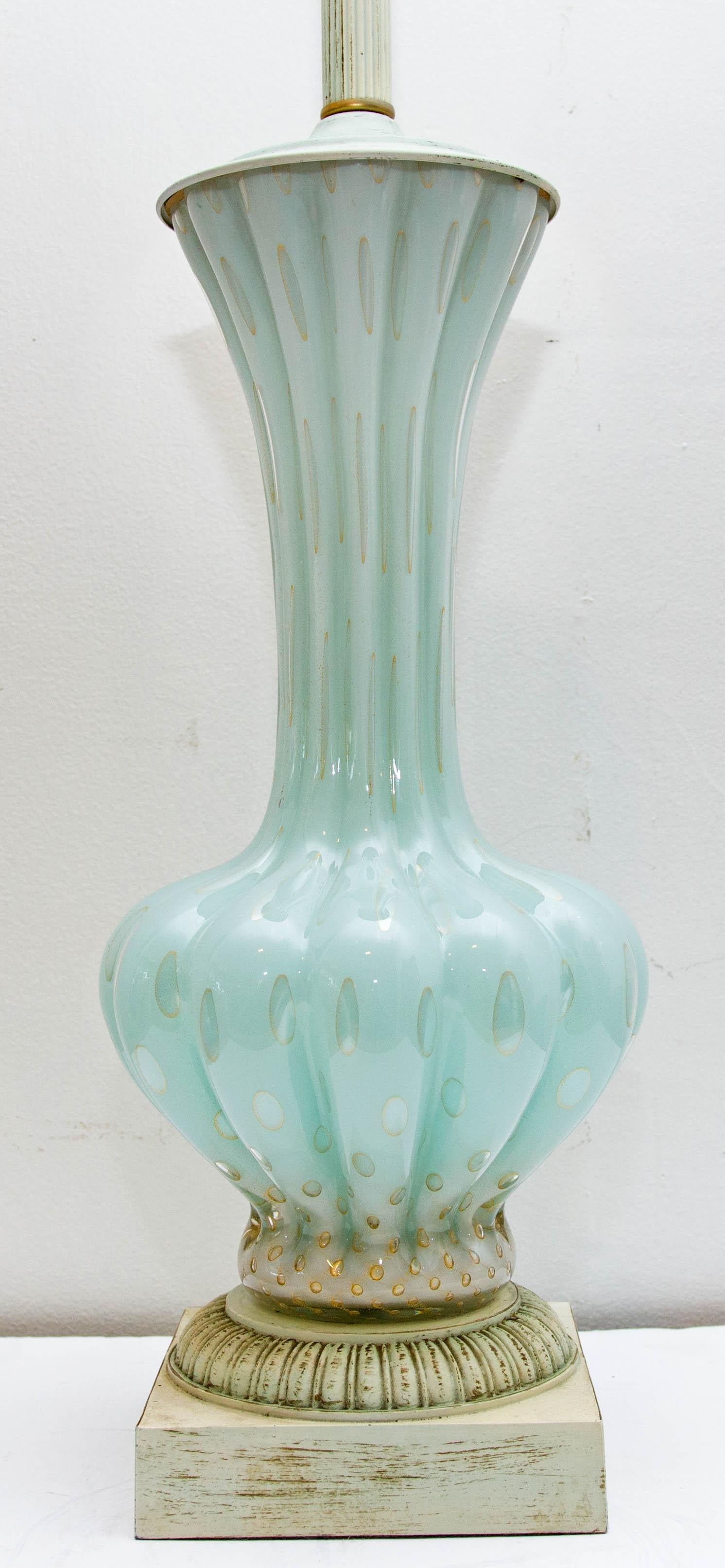 Venetian Murano glass table lamp. Light blue with gold flecks. Unusual finial, circa 1960. No shade. Height to top of finial is 37